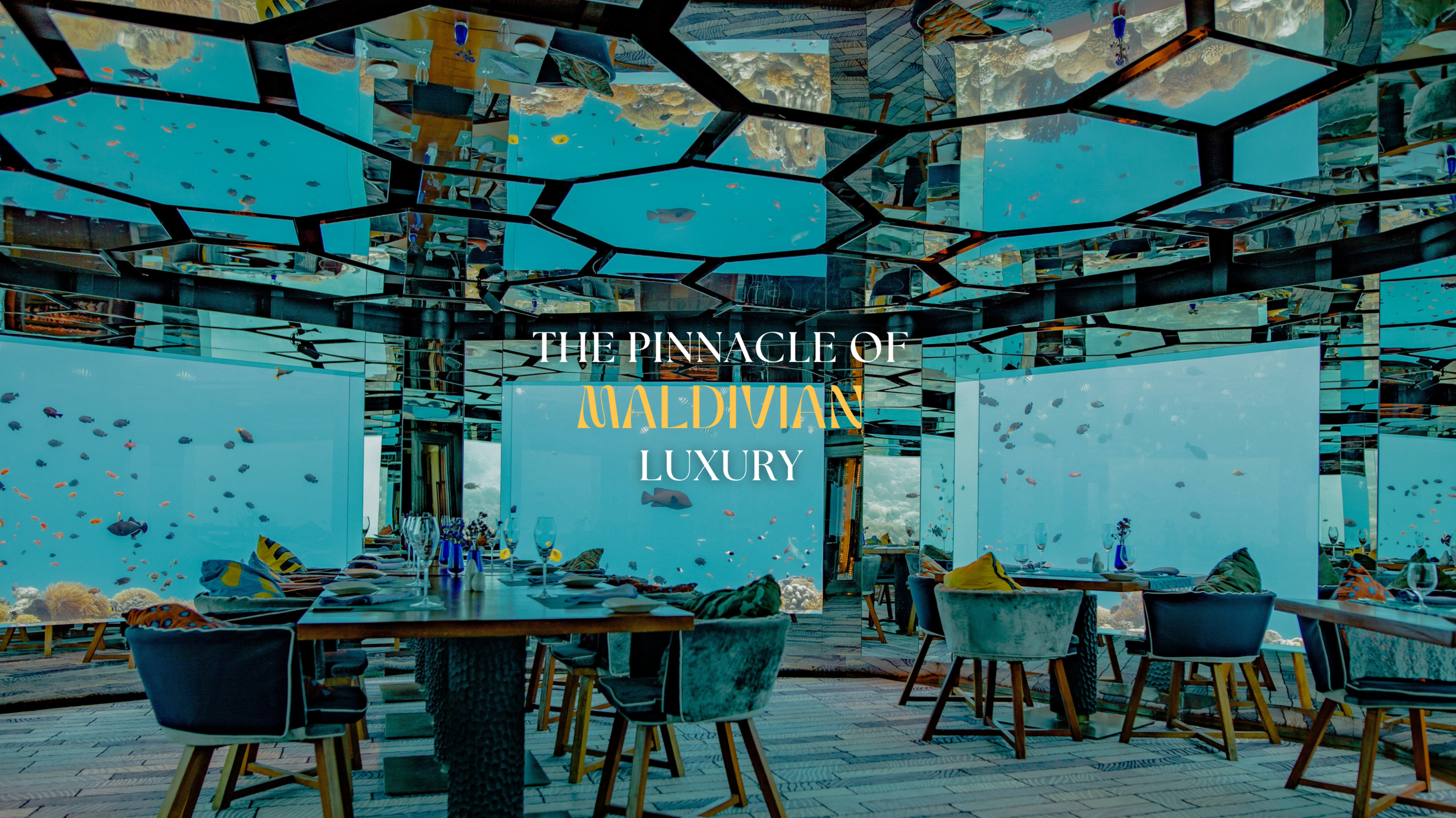 Elegant restaurant interior with a marine theme, featuring reflective ceiling panels and large aquarium views. Tables are set with glassware and colorful napkins, surrounded by comfortable chairs.