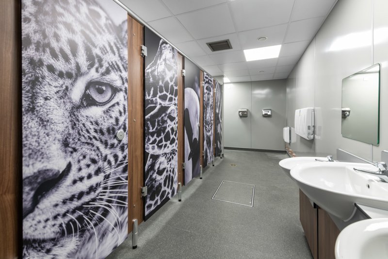 female toilet cubicles with image printed doors and vanity unit at banham zoo.jpg