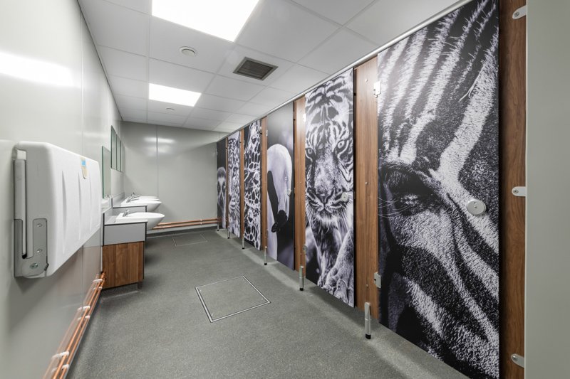 female toilet cubicles with image printed doors, vanity unit, baby change at banham zoo.jpg