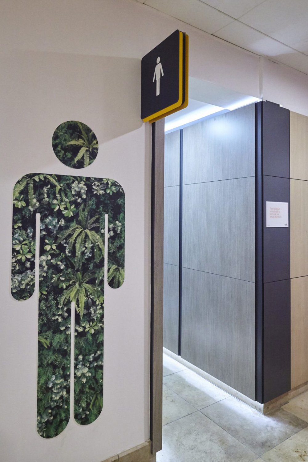 Male sign and green gallery wall mural outside uxbridge shopping centre toilets.jpg