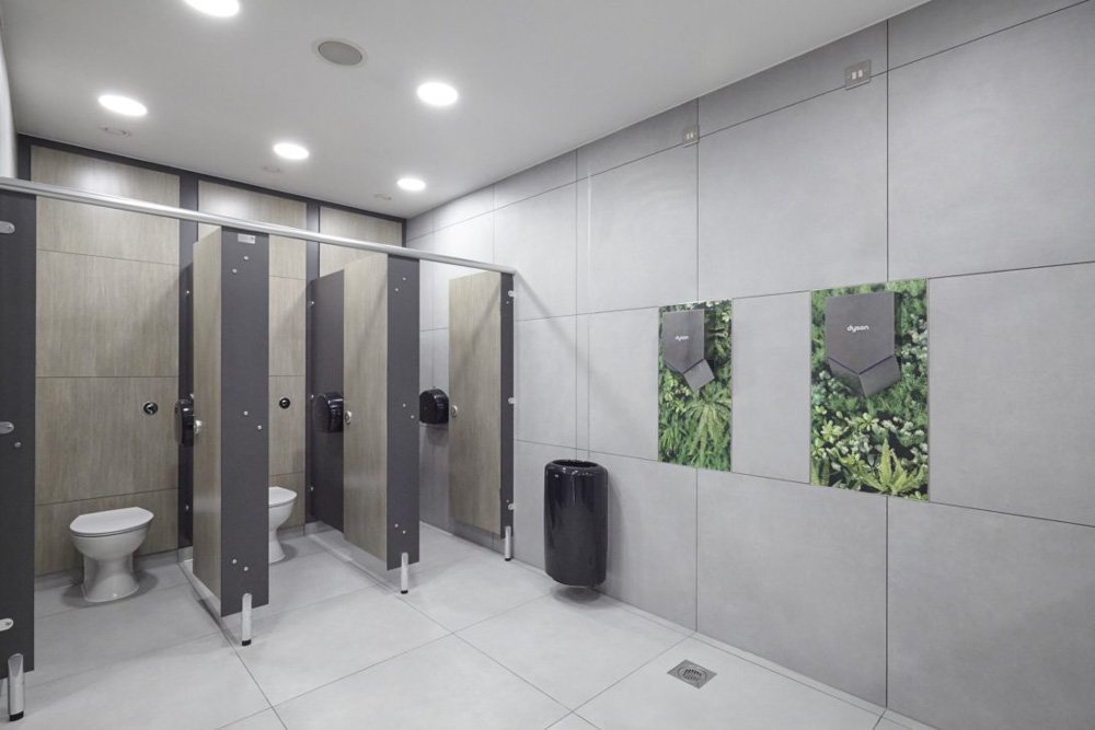 shopping centre toilets with grey cubicles and wall tiles, gallery splashbacks.jpg
