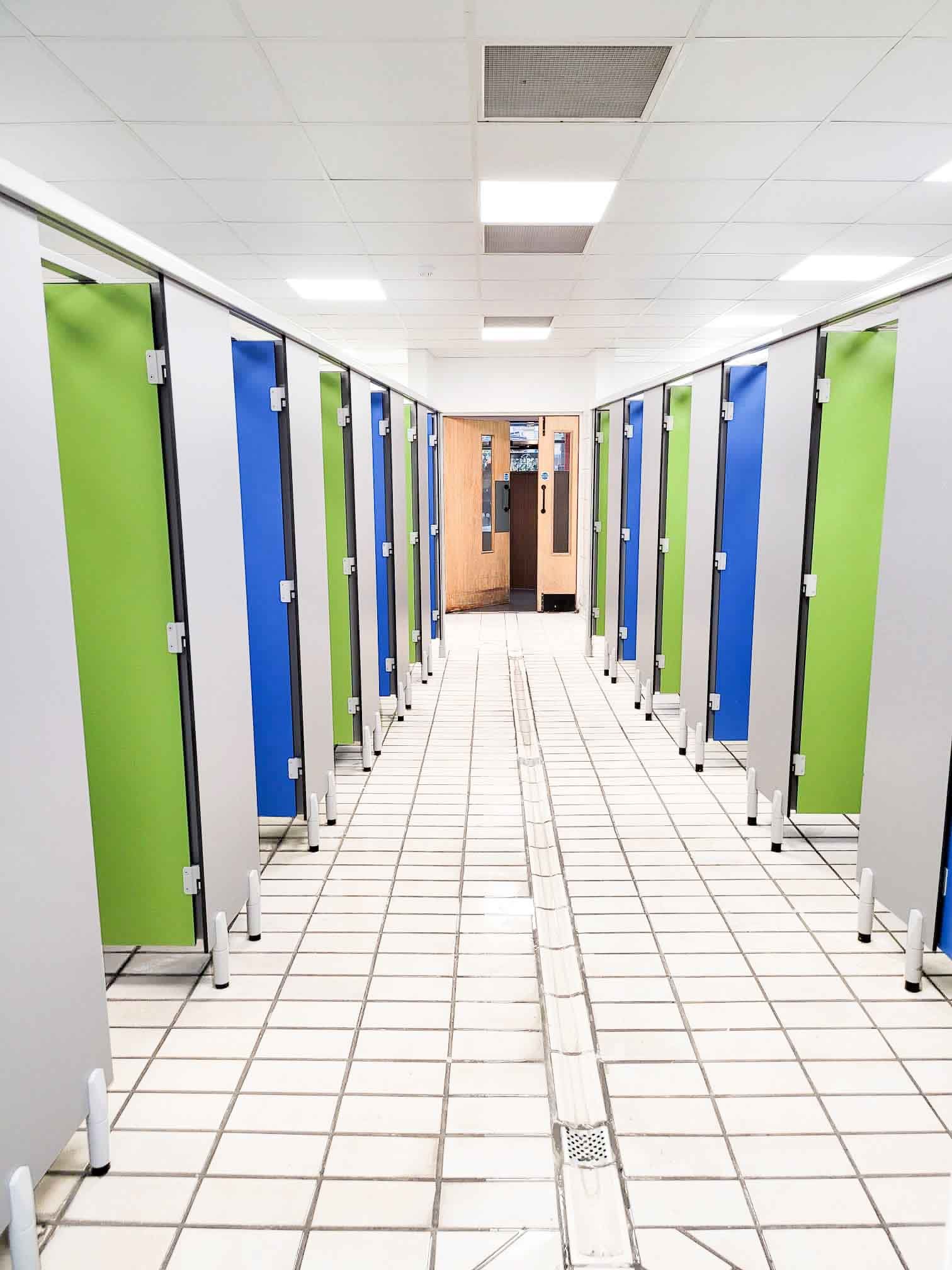 green and blue changing cubicle block at herons leisure centre.jpg