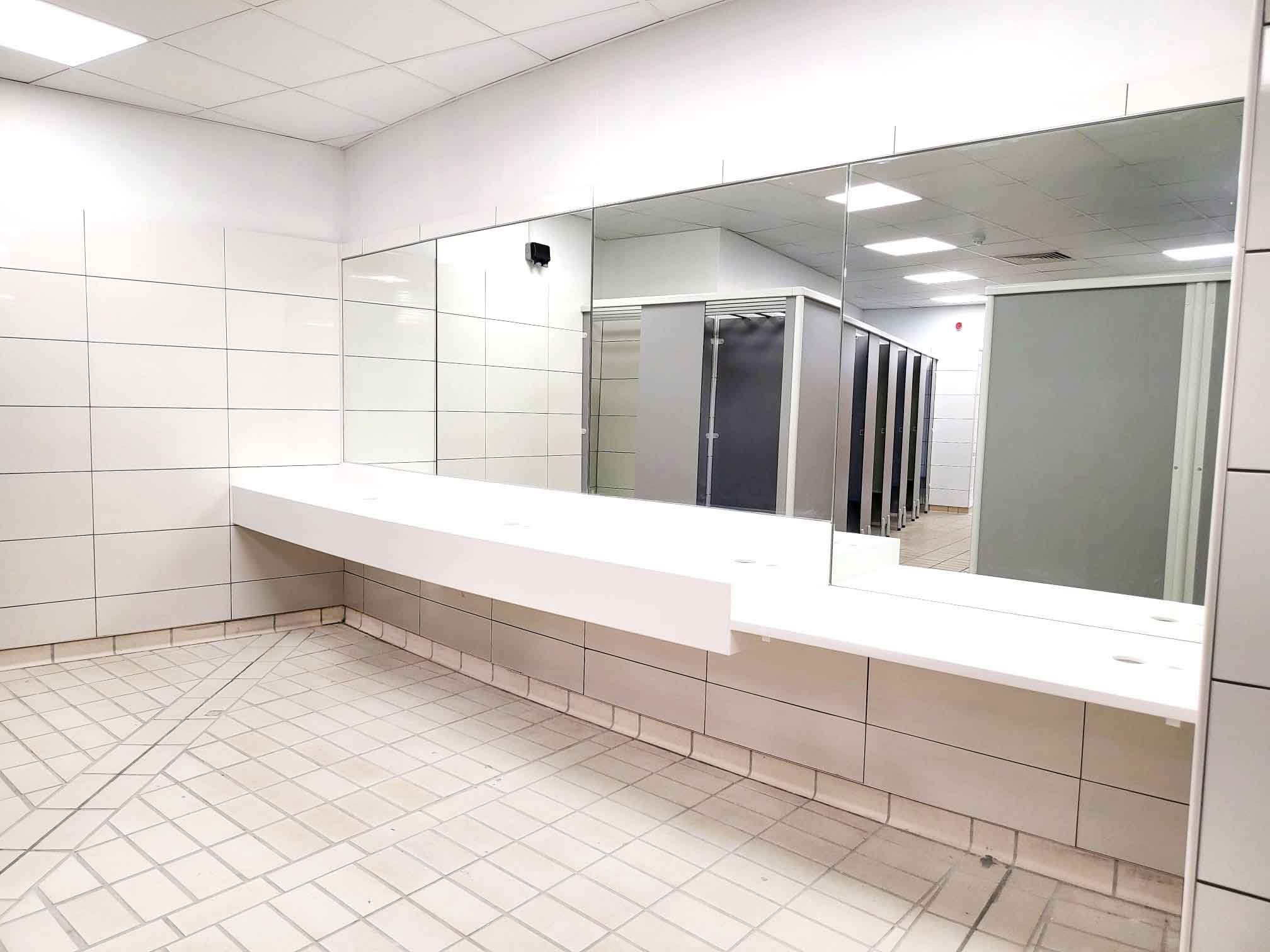 vanity area with mirrors above in changing room at herons leisure centre.jpg