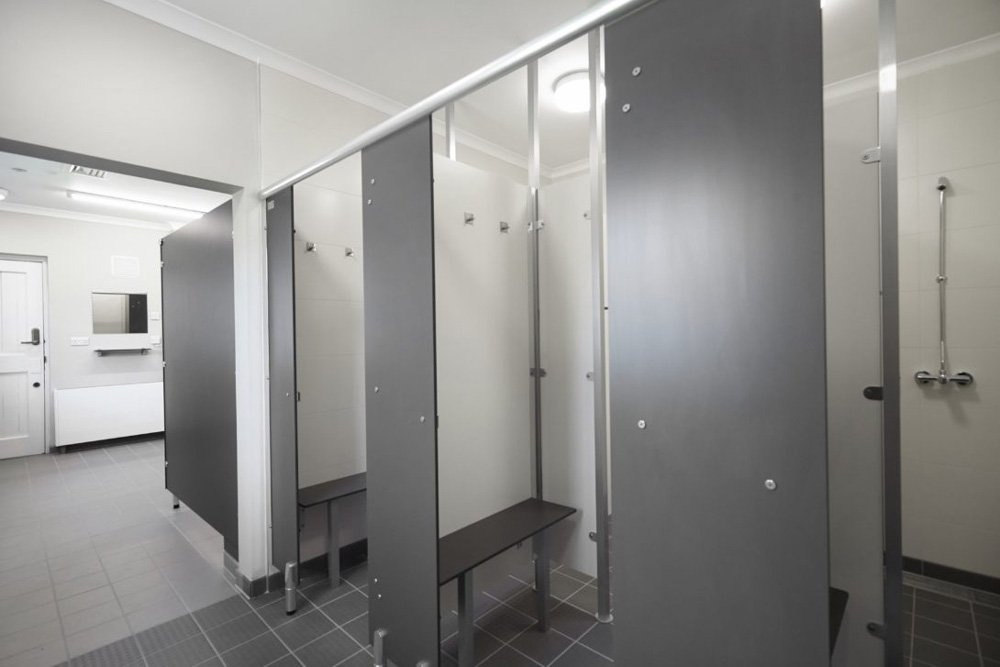 Shower cubicles with built in changing areas and benching at waterclose meadows campsite.jpg