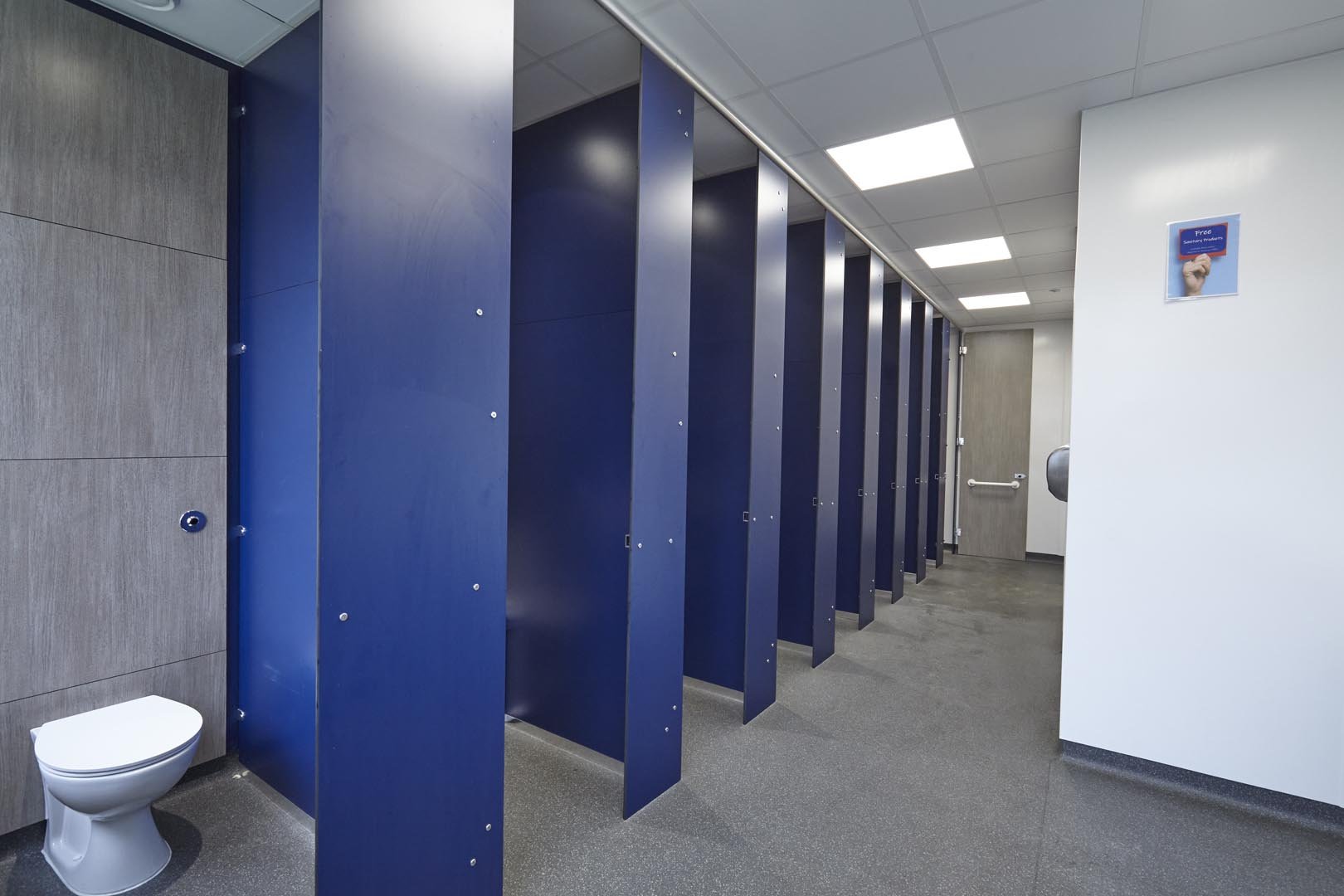 navy and grey unisex privacy toilet cubicles at collingwood college.jpg