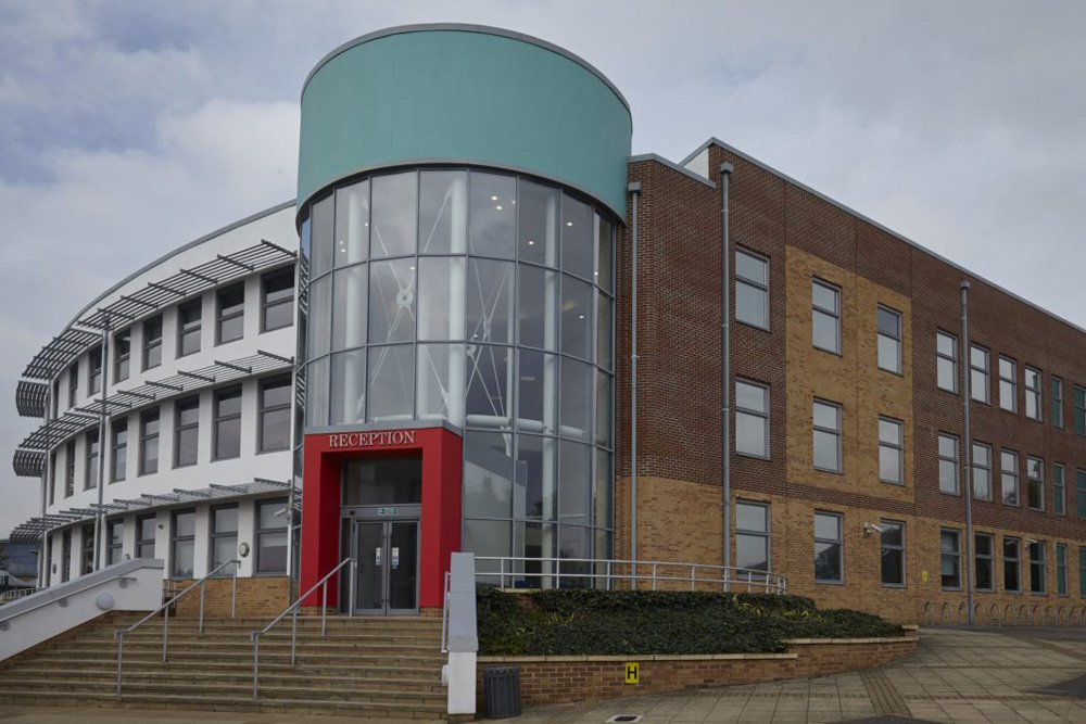 entrance to building at ark acton academy.jpg