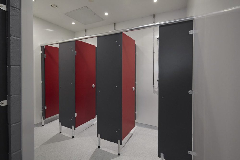 shower cubicles in the changing room at ark acton academy.jpg