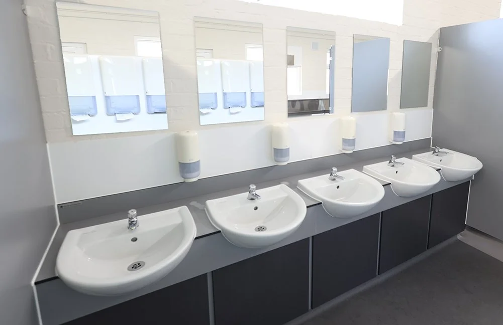 Full suite of wash basins with mirros at Ascot Racecourse.jpg