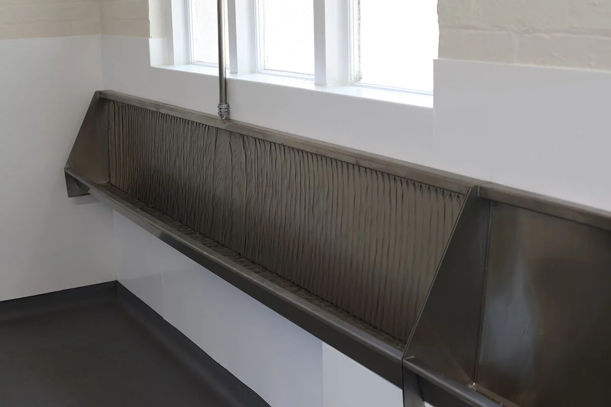 Stainless steel urinals at Ascot Racecourse.jpg