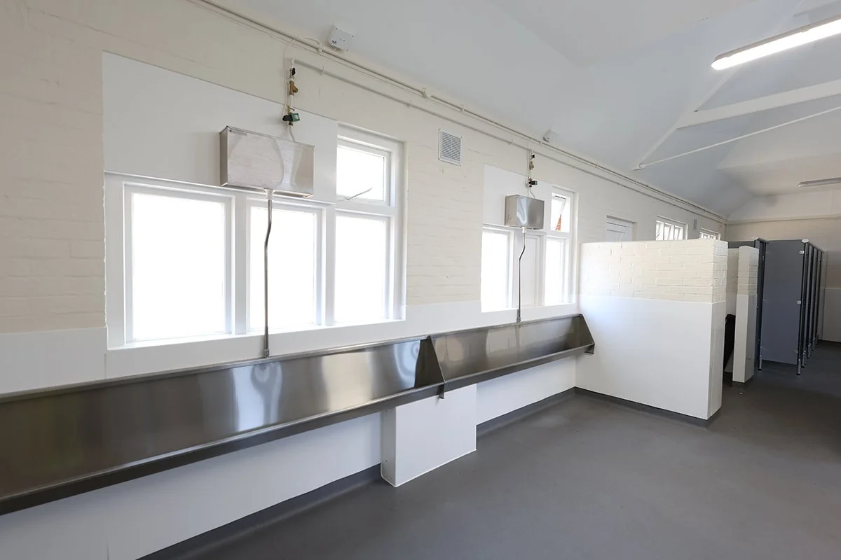 Two stainless steel urinals at Ascot Racecourse.jpg