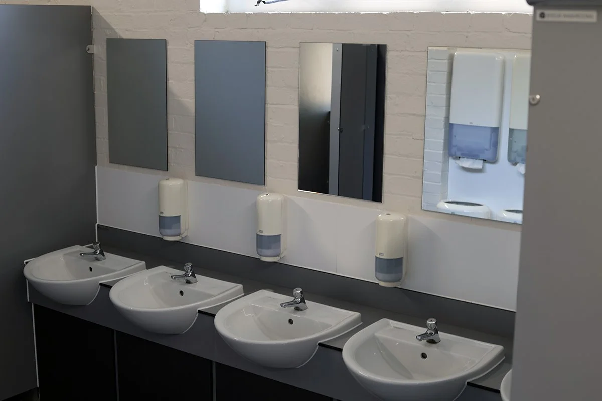 Wash basins and rectangular mirrors at Ascot Racecourse.jpg