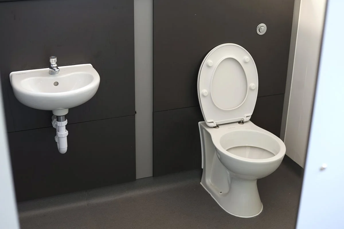 Toilet and basin within a superloo cubicle at Ascot Racecourse.jpg
