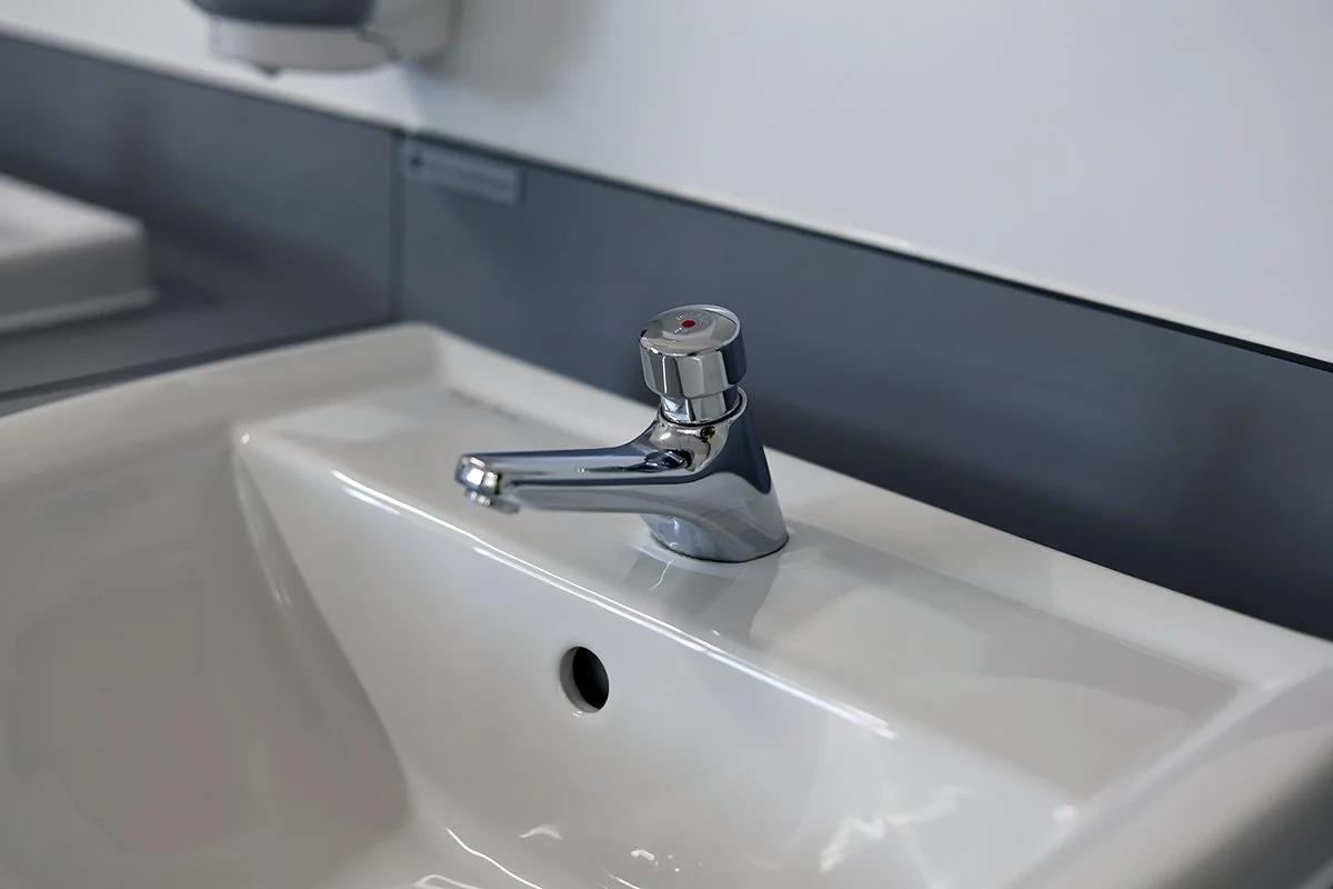 Push tap on a wash basin at Ascot Racecourse.jpg