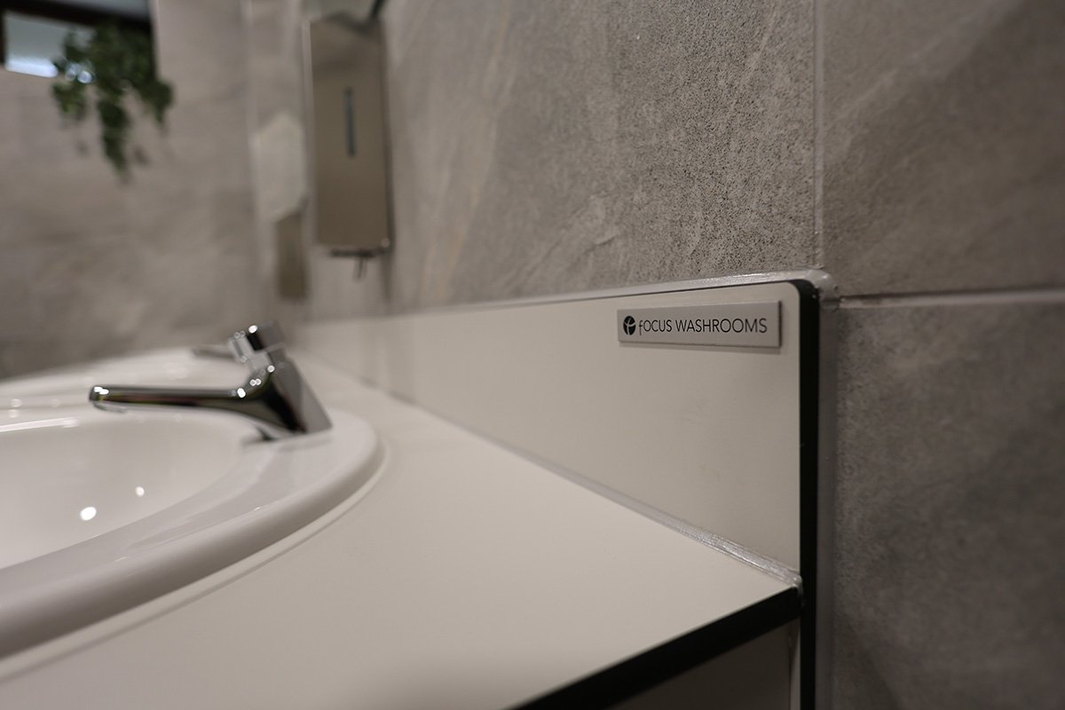 Focus washrooms badge on vanity unit at golf club.jpg