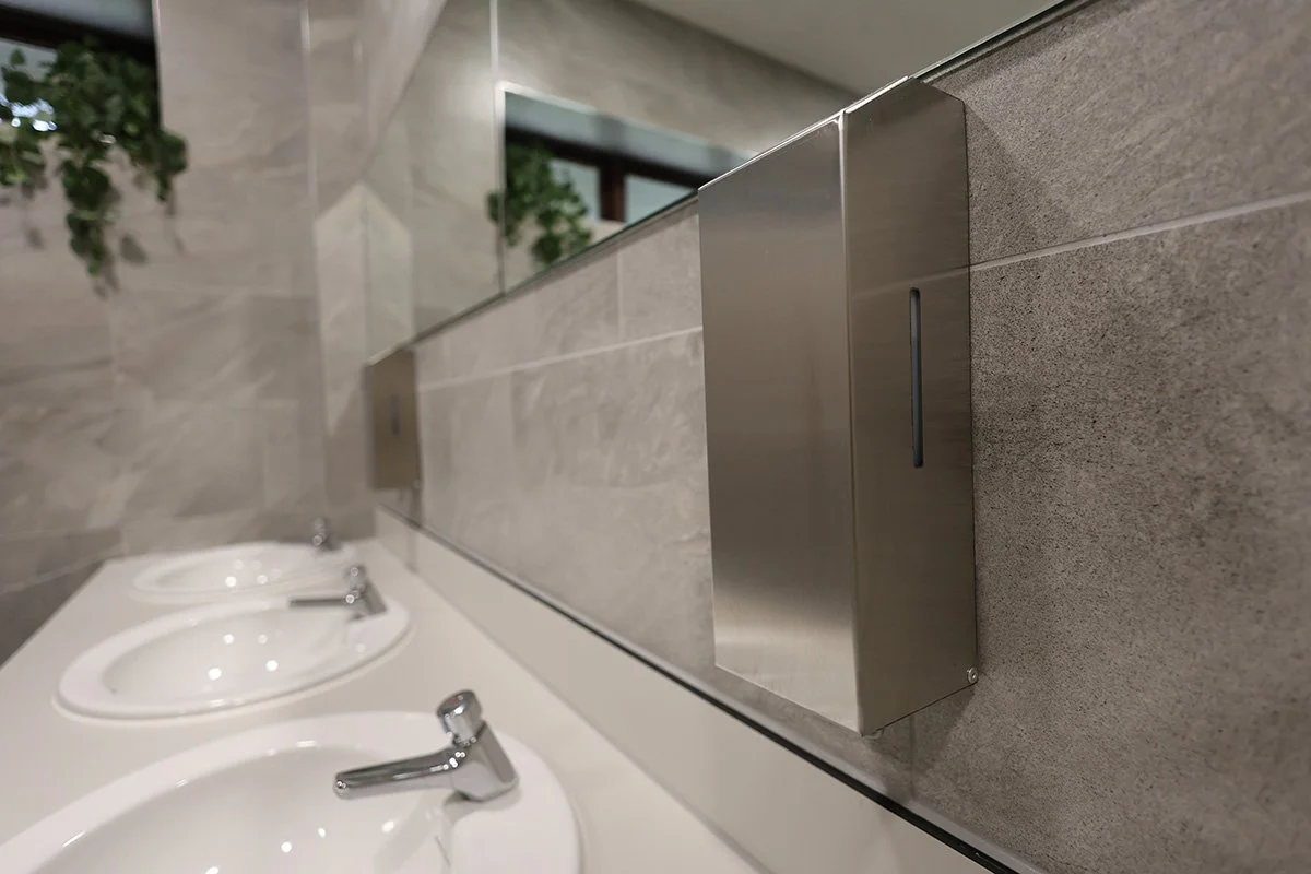 Stainless steel soap dispenser at golf club.jpg