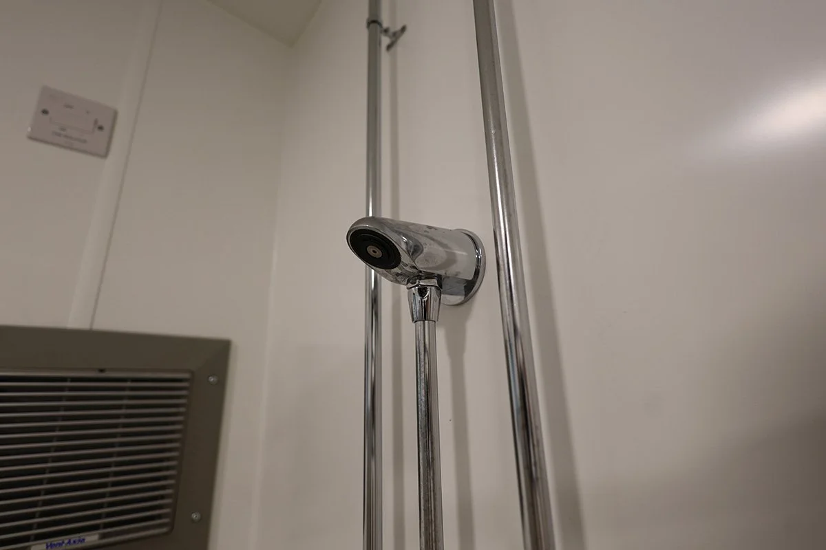 Anti vandal shower head at golf club.jpg