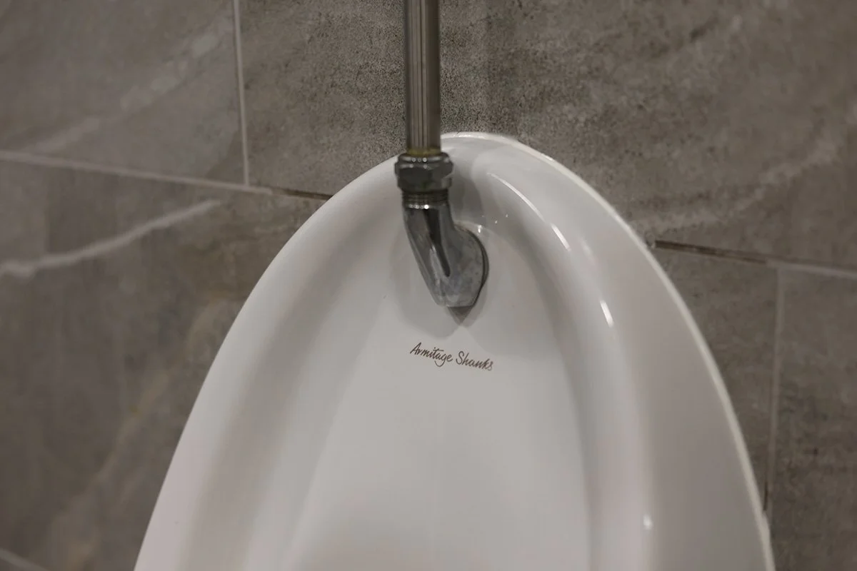Close up of urinal at golf club.jpg
