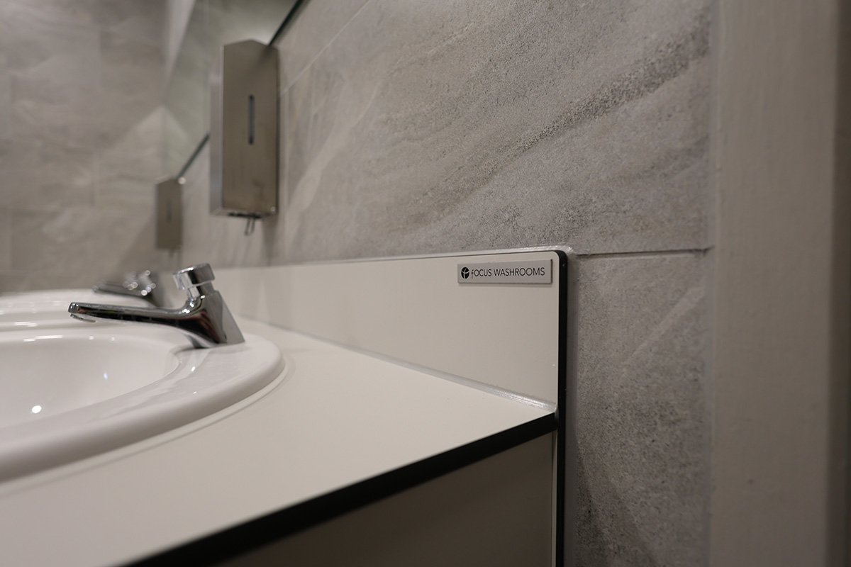 Focus washrooms badge on vanity unit at golf club.jpg