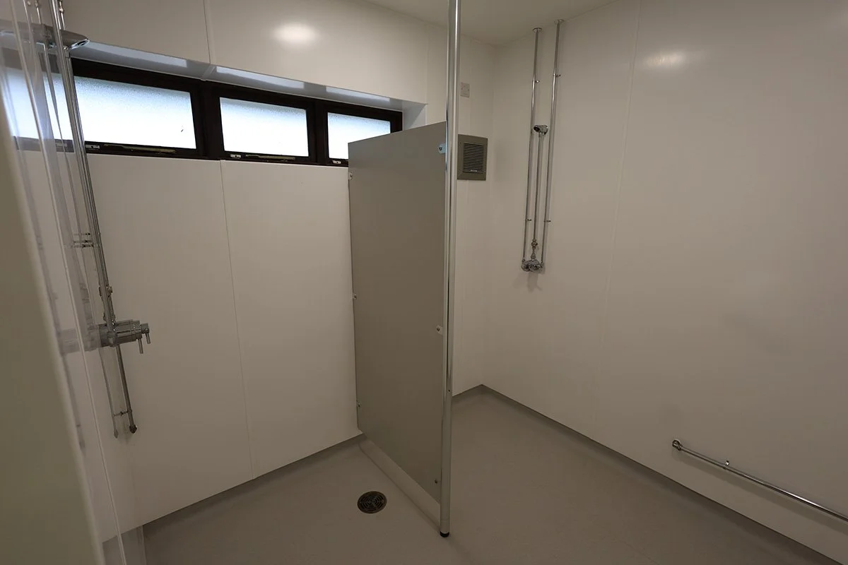 Mens shower partition with anti vandal showers at golf club.jpg