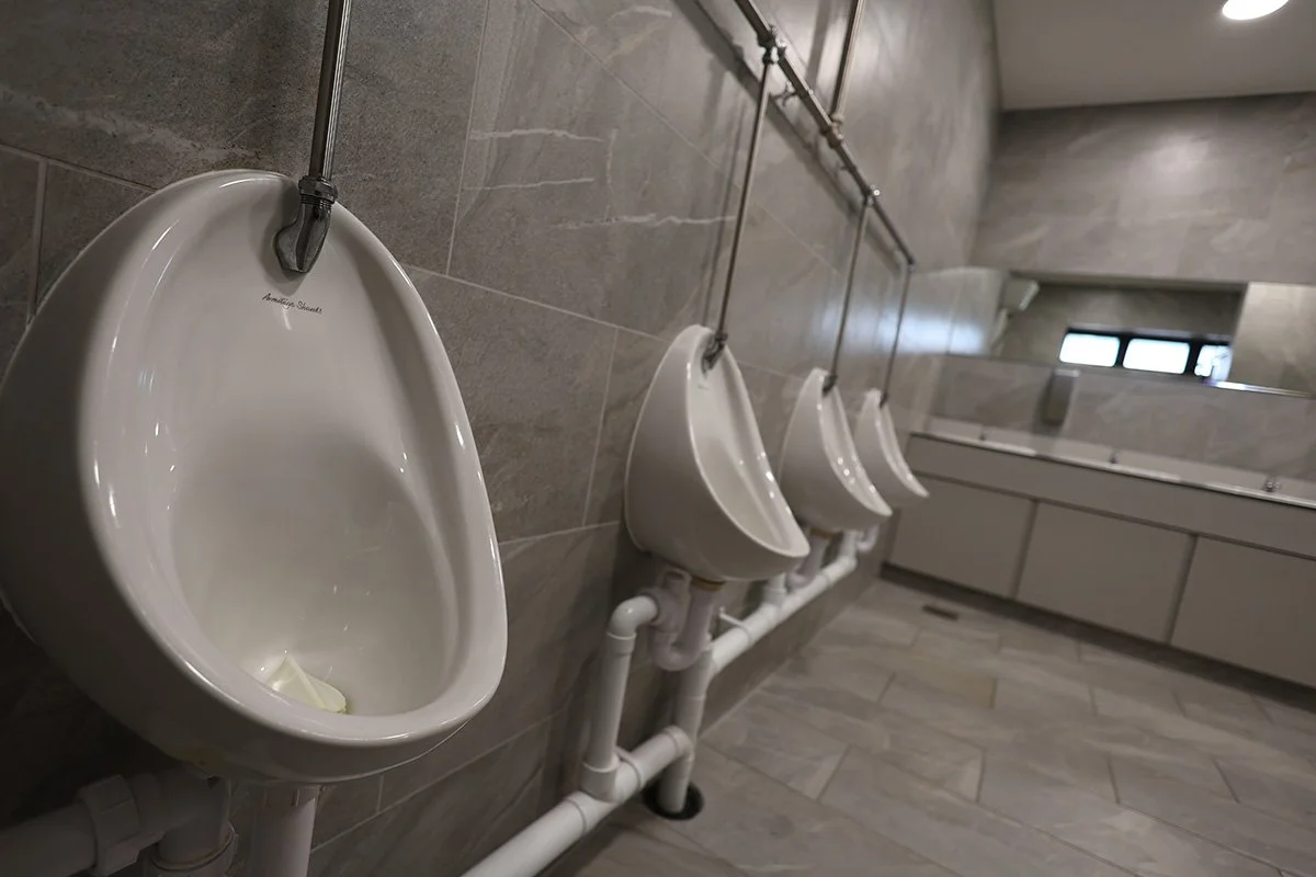 Wide shot of urinals at golf club.jpg