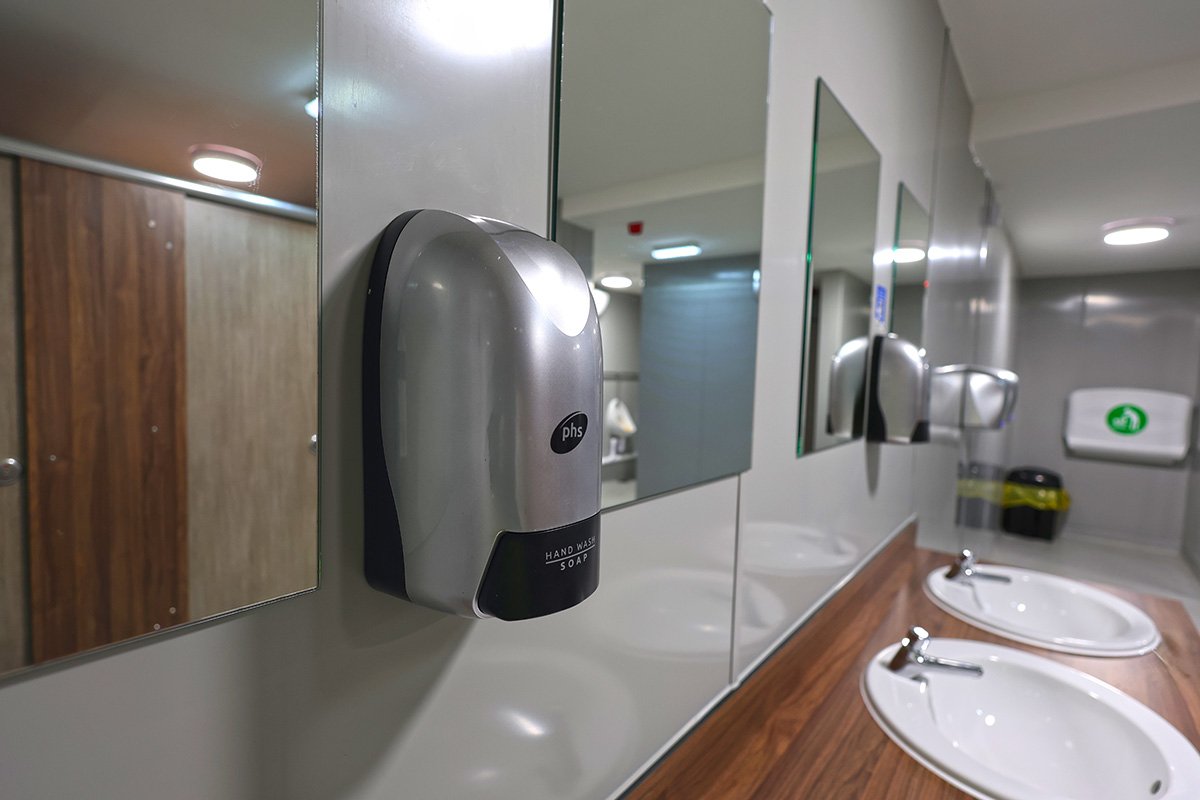 Soap dispensers and mirrors at holiday park.jpg