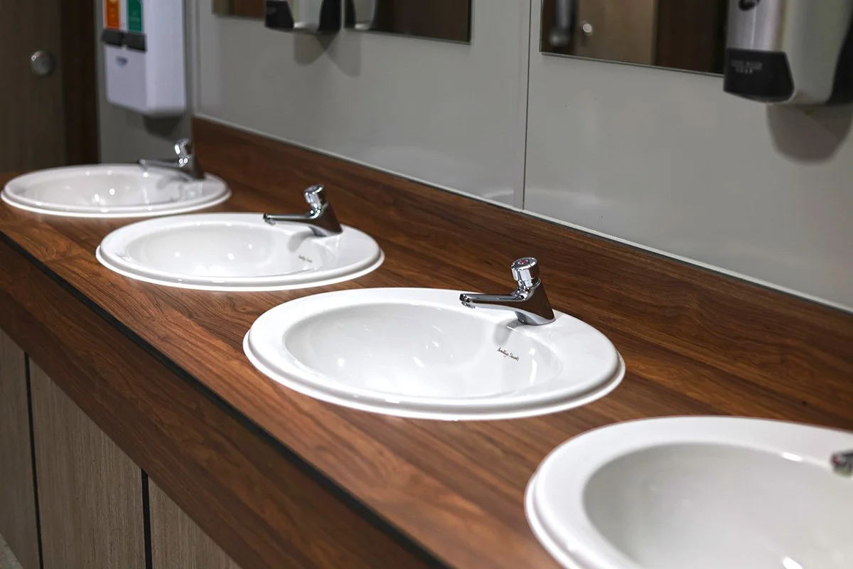 Fully recessed wash basins at holiday park.jpg