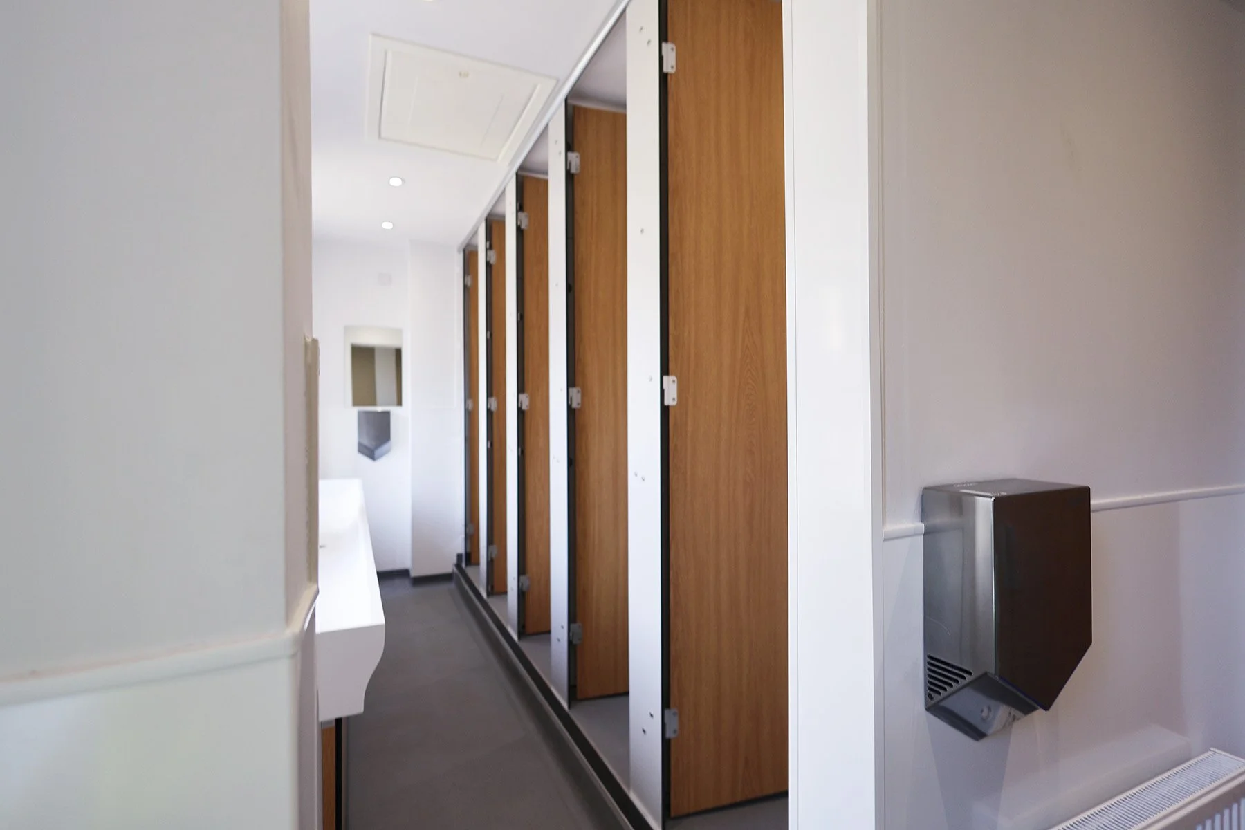 Full height toilet cubicles at Lancing College.jpg