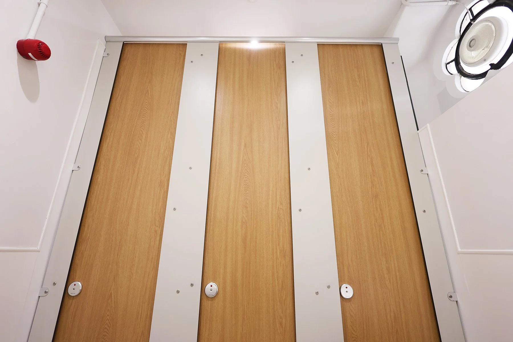 Full height cubicles from below at Lancing College.jpg