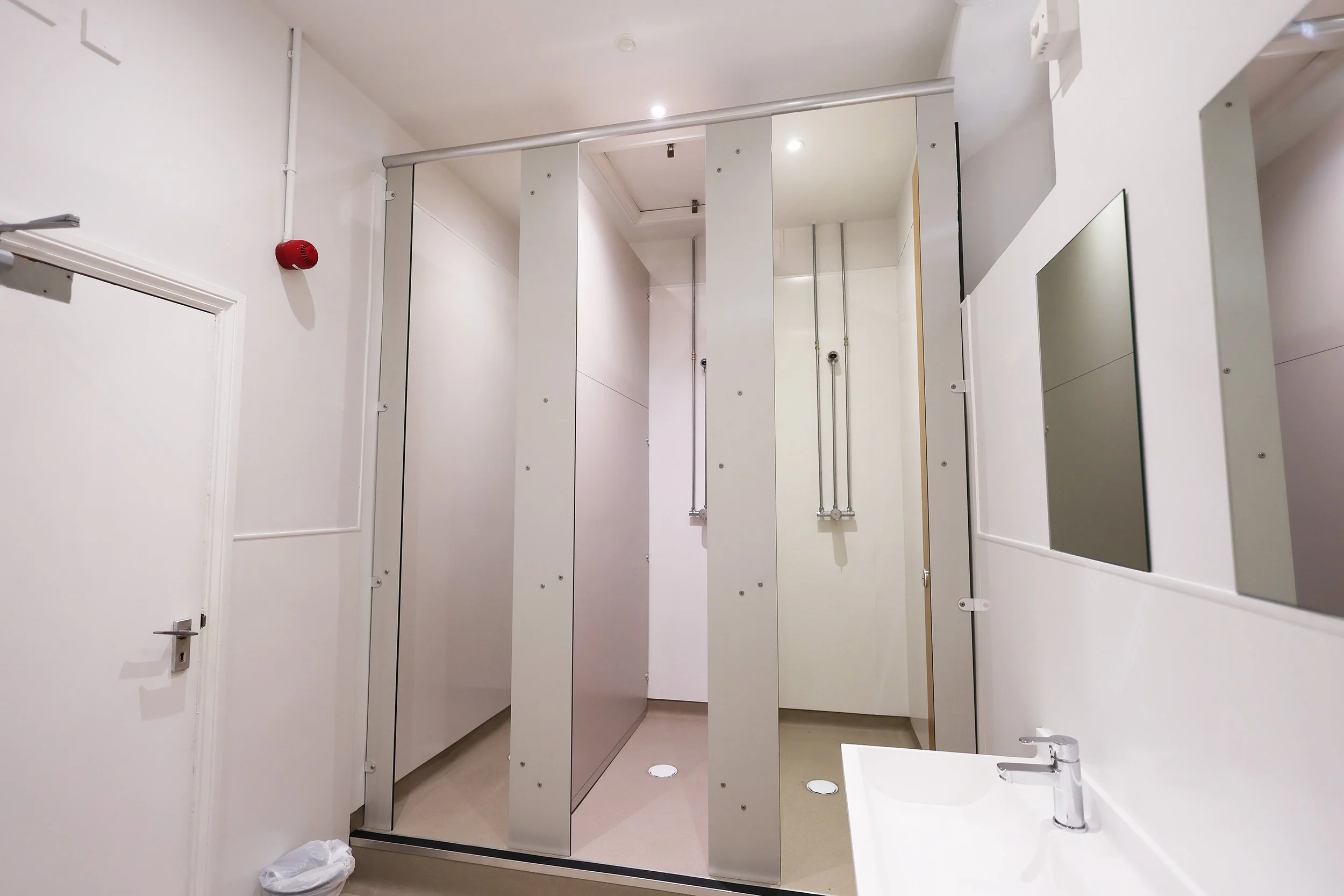 Full height shower cubicles at Lancing College.jpg