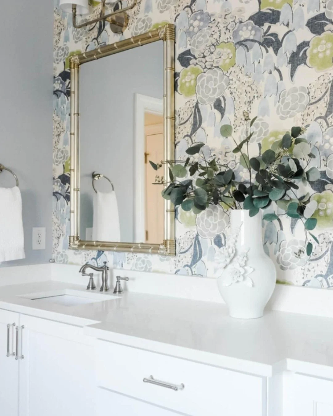 GO ON, HAVE THE BLUES. This primary bathroom started with one decision: wallpaper. Once we found the perfect patterns, the rest of the design followed. 💙