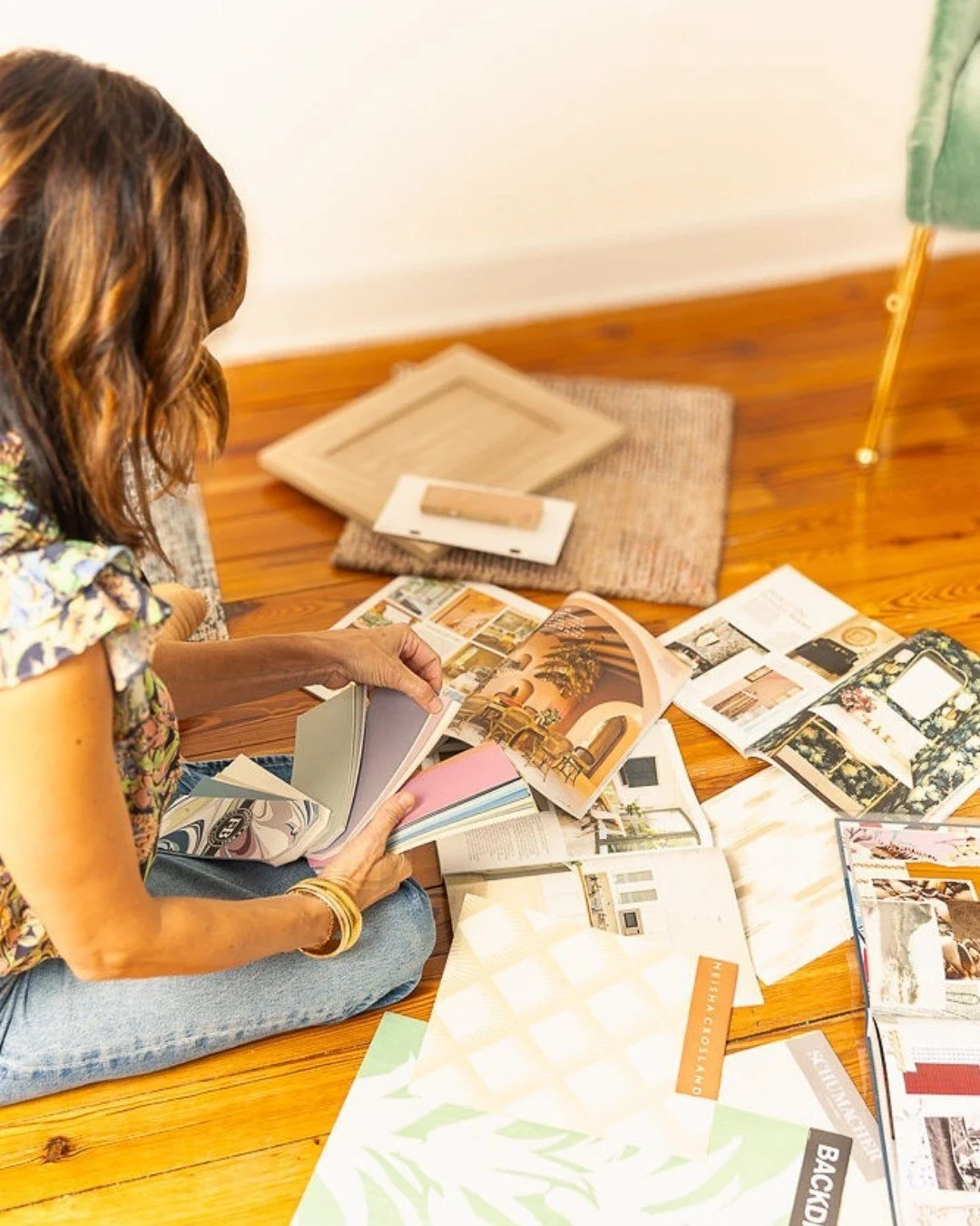 A LOVE AFFAIR WITH PATTERN AND COLOR. The real design process? Paint chips everywhere. Wallpaper stacks upon stacks. Fabric samples taking over every surface. Every mix is intentional &mdash; curated for the client, the function, and the feeling the 