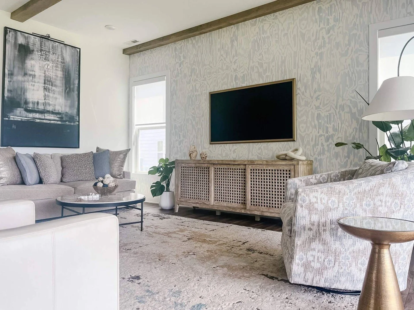 RELAX IN STYLE. Thoughtful layout. Comfortable seating. Layers that warm up the whole space. Perfection.