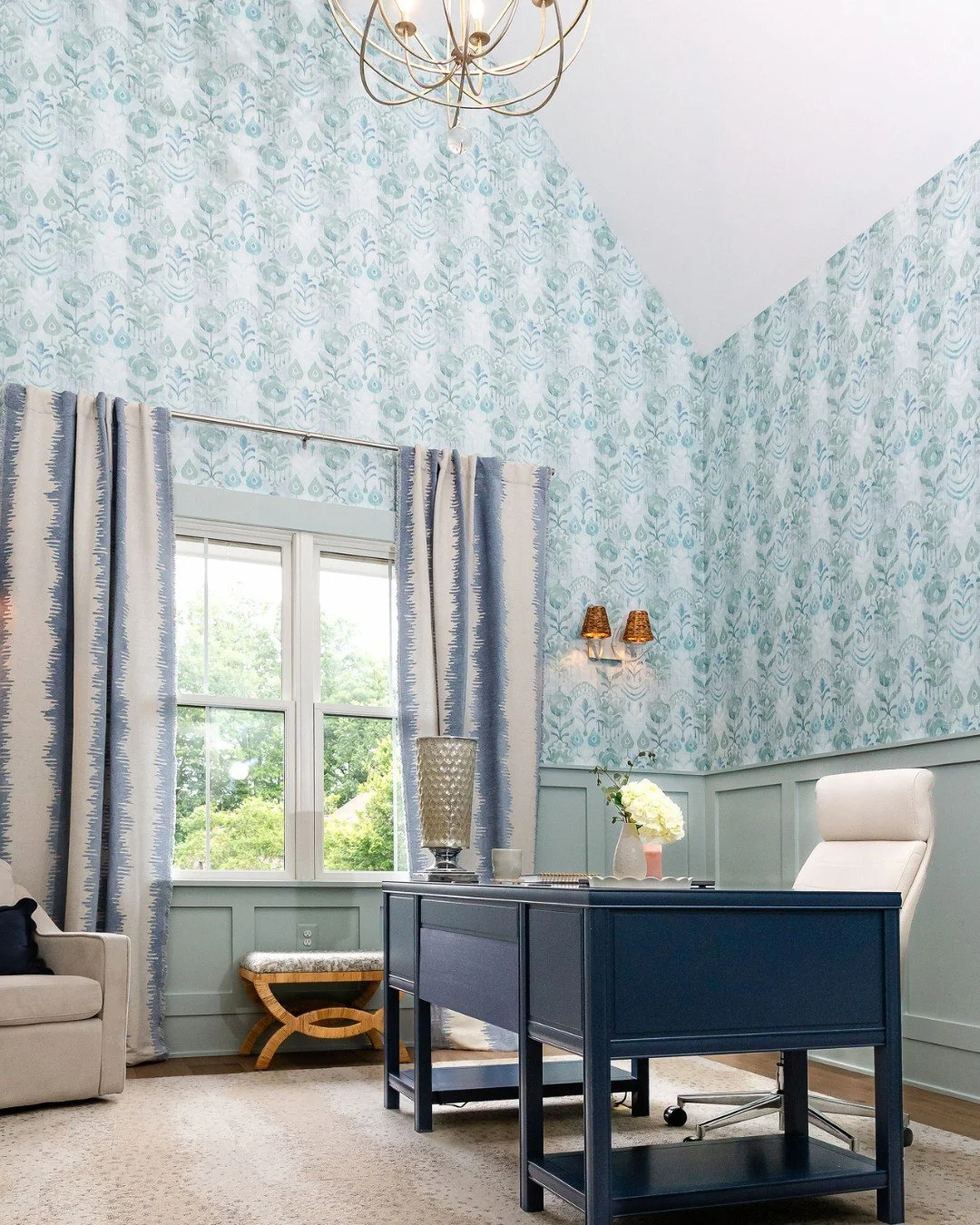 LET THE WORK WEEK BEGIN! Even the worst case of the Mondays is no match for an inspiring home office redesign like this one. 

A couple of our favorite design highlights: 
&bull; pairing board and batten with a vertical wallpaper pattern to play up t