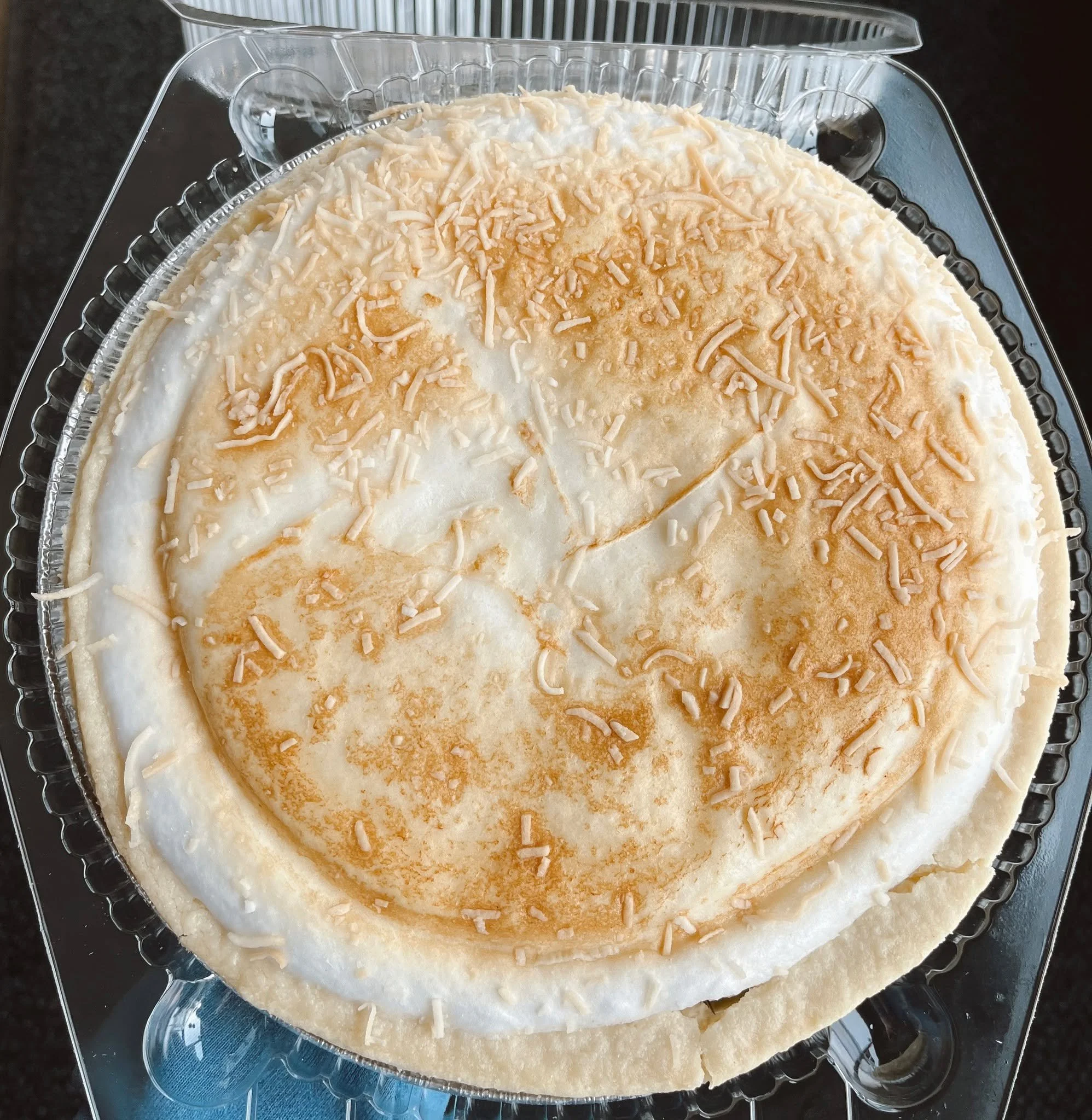 PIE OF THE WEEK! 🥧 Enjoy the light and refreshing taste of our coconut meringue pie for 30% off all week! 🥥