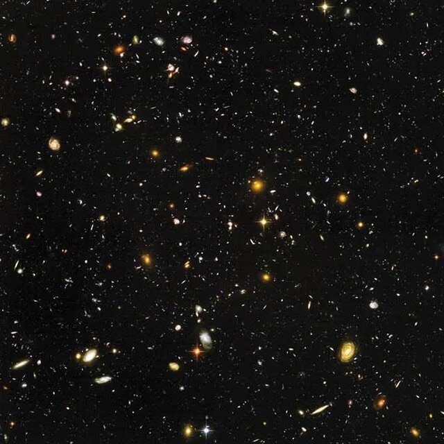 The image that first made us wonder even more about our place in the universe and if we are alone! 

This view of nearly 10,000 galaxies is called the Hubble Ultra Deep Field. The snapshot includes galaxies of various ages, sizes, shapes, and colours