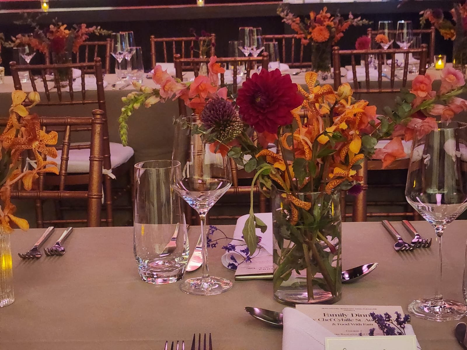 Yellow and purple flower arrangements on a table