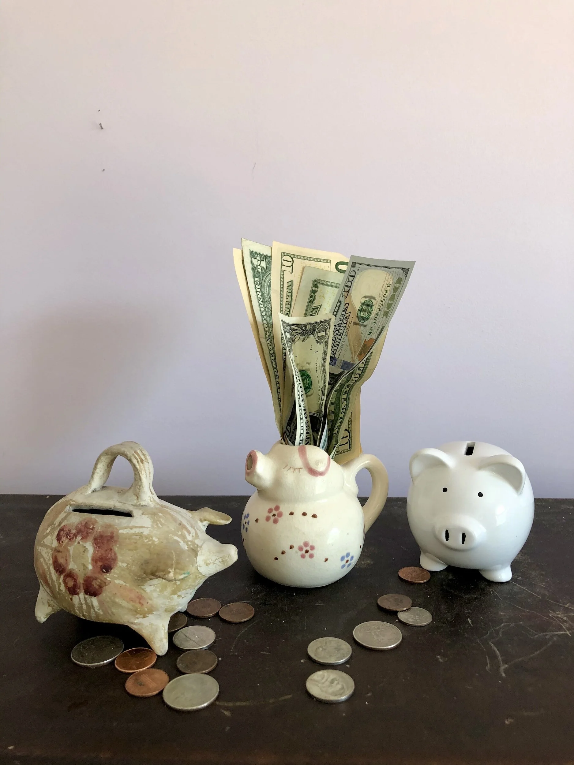 Different kinds of piggy banks representing different college funding vehicles.