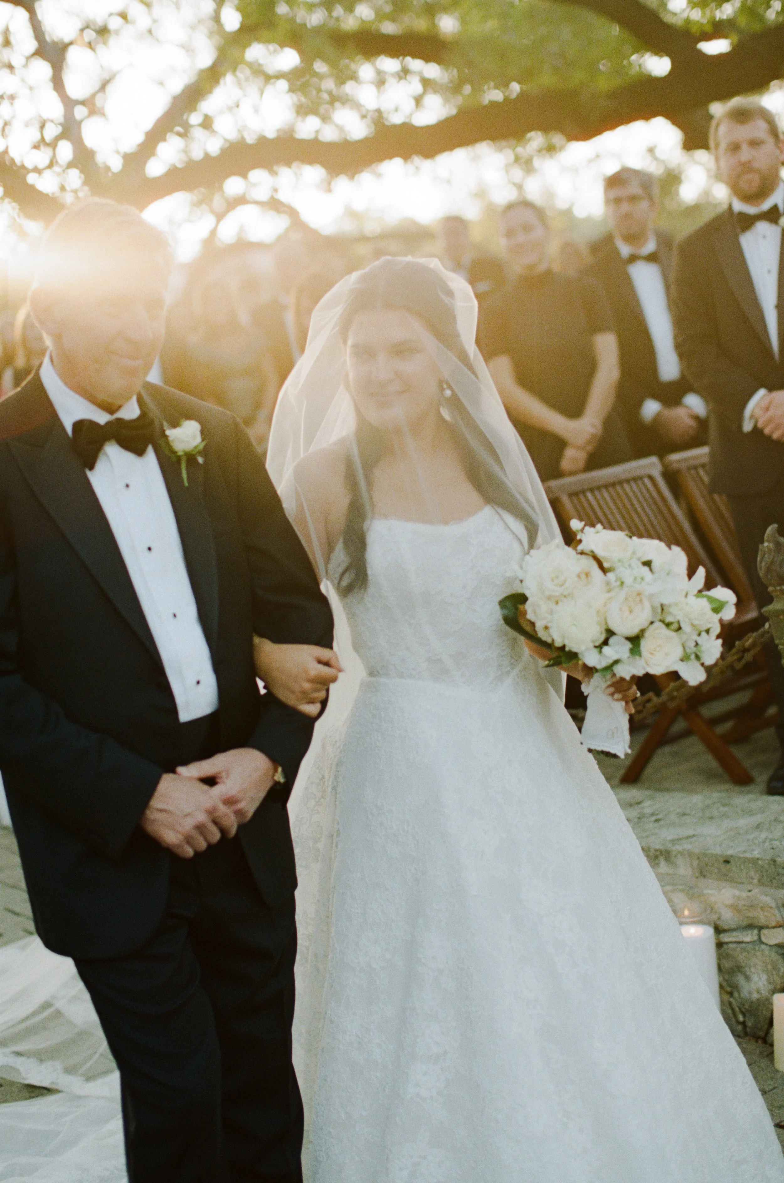 Wedding ceremony under oaks at Camp Lucy Sacred Oaks, Dripping Springs TX — Kristin Cattered Events, film photography by Lauren Nicole