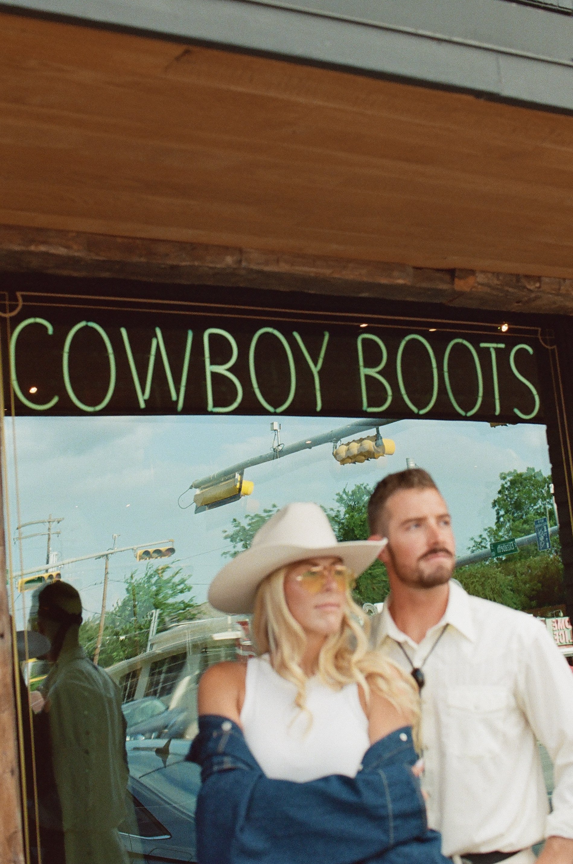 Western high fashion engagement session on South Congress, Austin Texas — Allen's Boots, Tecovas, editorial film photography by Lauren Nicole Photo