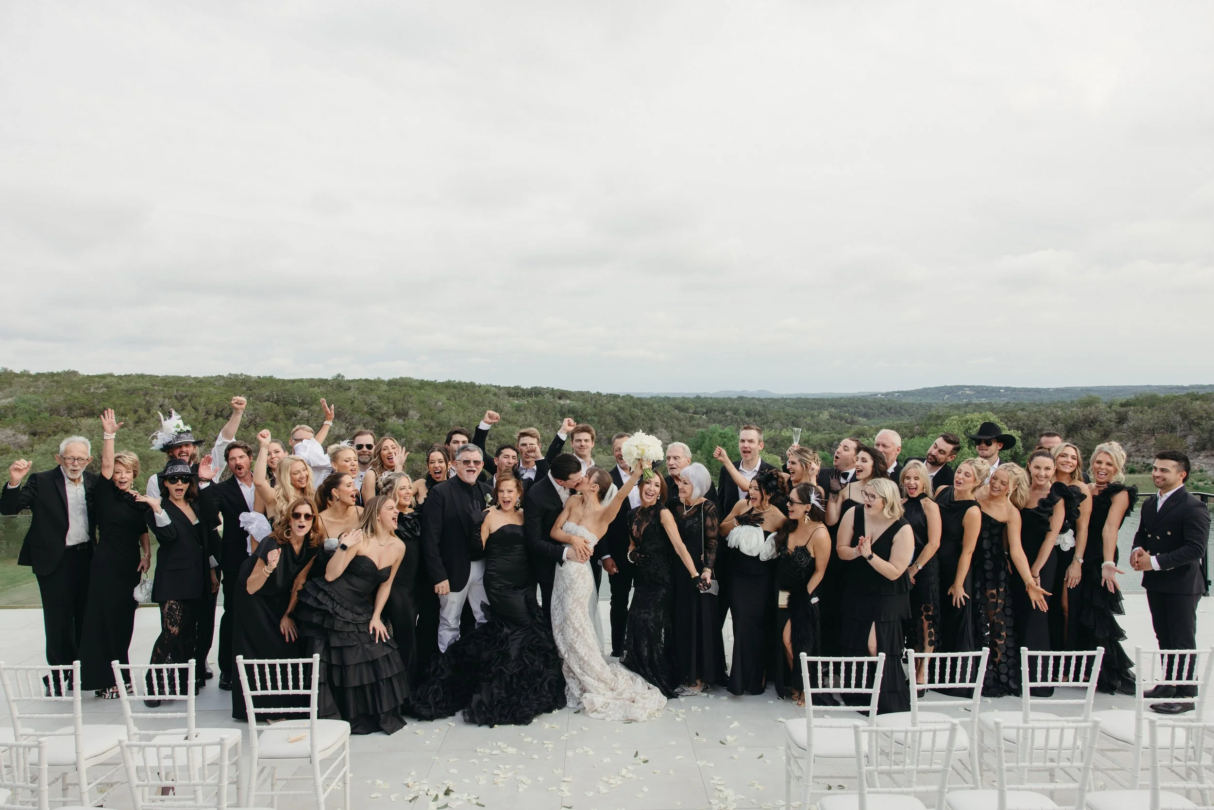 Wedding ceremony at The Videre Estate Wimberley Texas — Kentucky Derby aesthetic, black and white attire, film photography by Lauren Nicole Photo