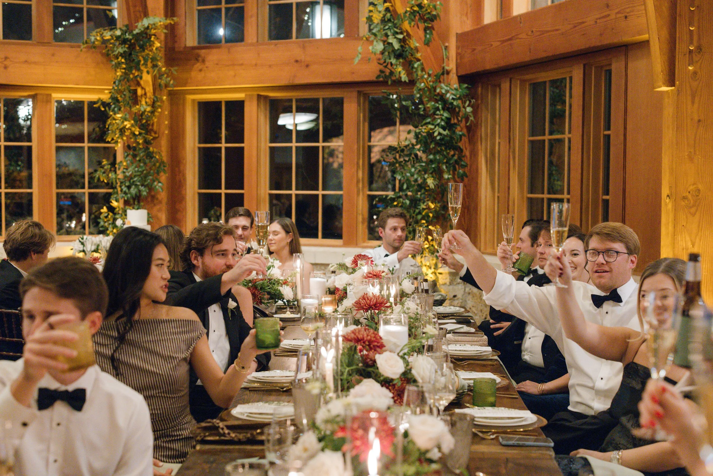 Old money floral wedding reception at Camp Lucy Sacred Oaks — candid documentary dance floor photography by Lauren Nicole Photo