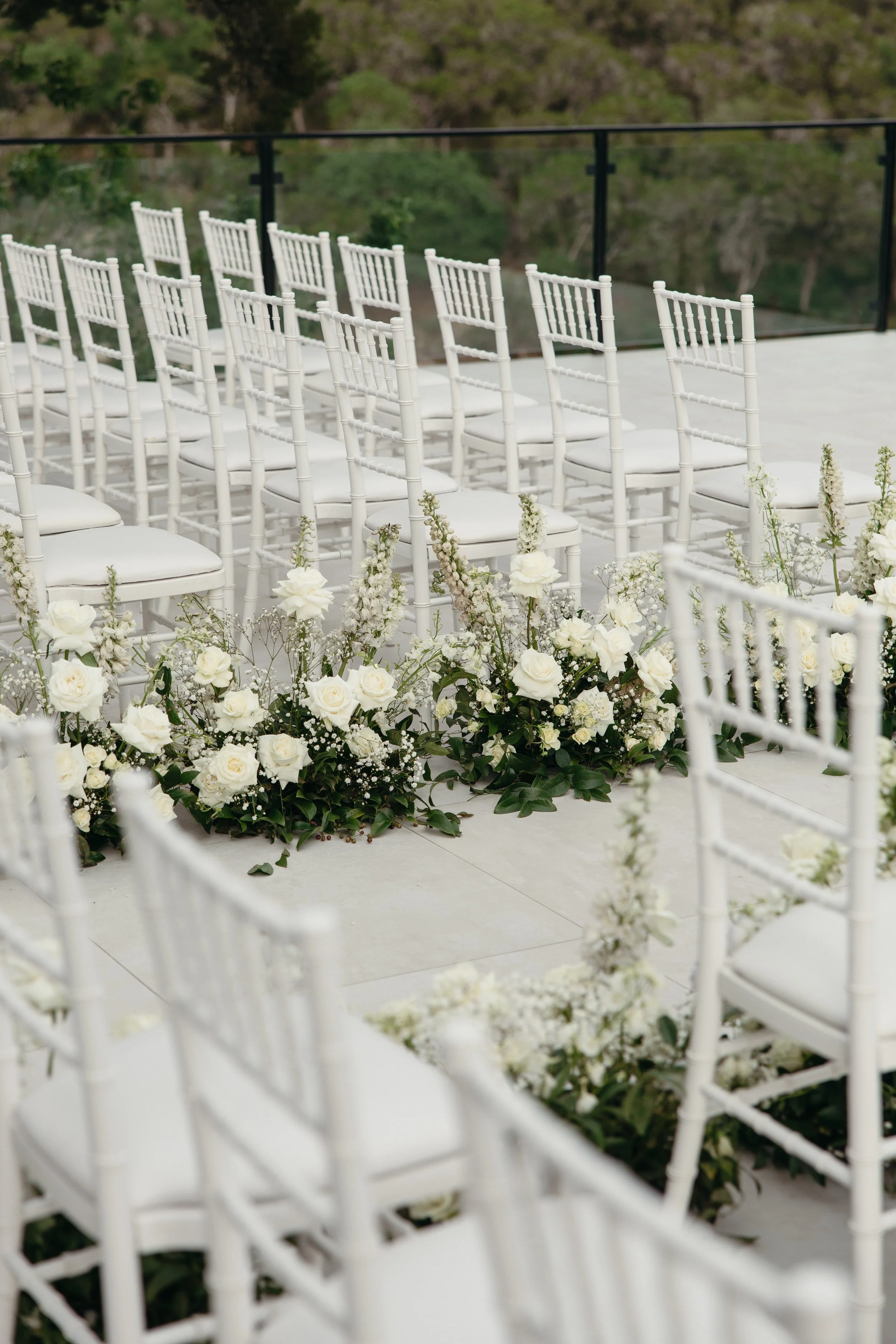 Wedding ceremony at The Videre Estate Wimberley Texas — Kentucky Derby aesthetic, black and white attire, film photography by Lauren Nicole Photo