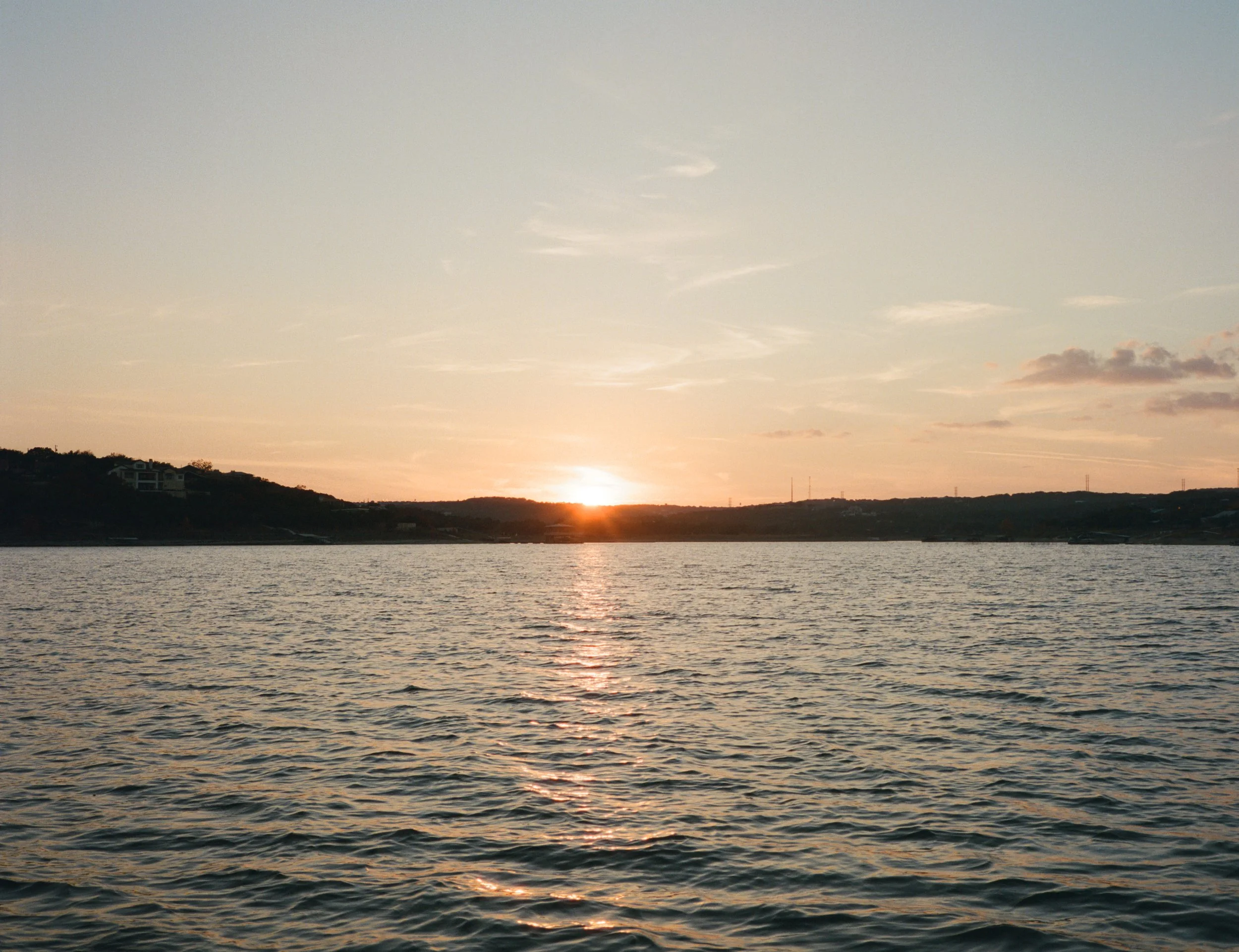 Coastal aesthetic sailboat engagement session, Lake Travis Austin TX — editorial analog photography by Lauren Nicole