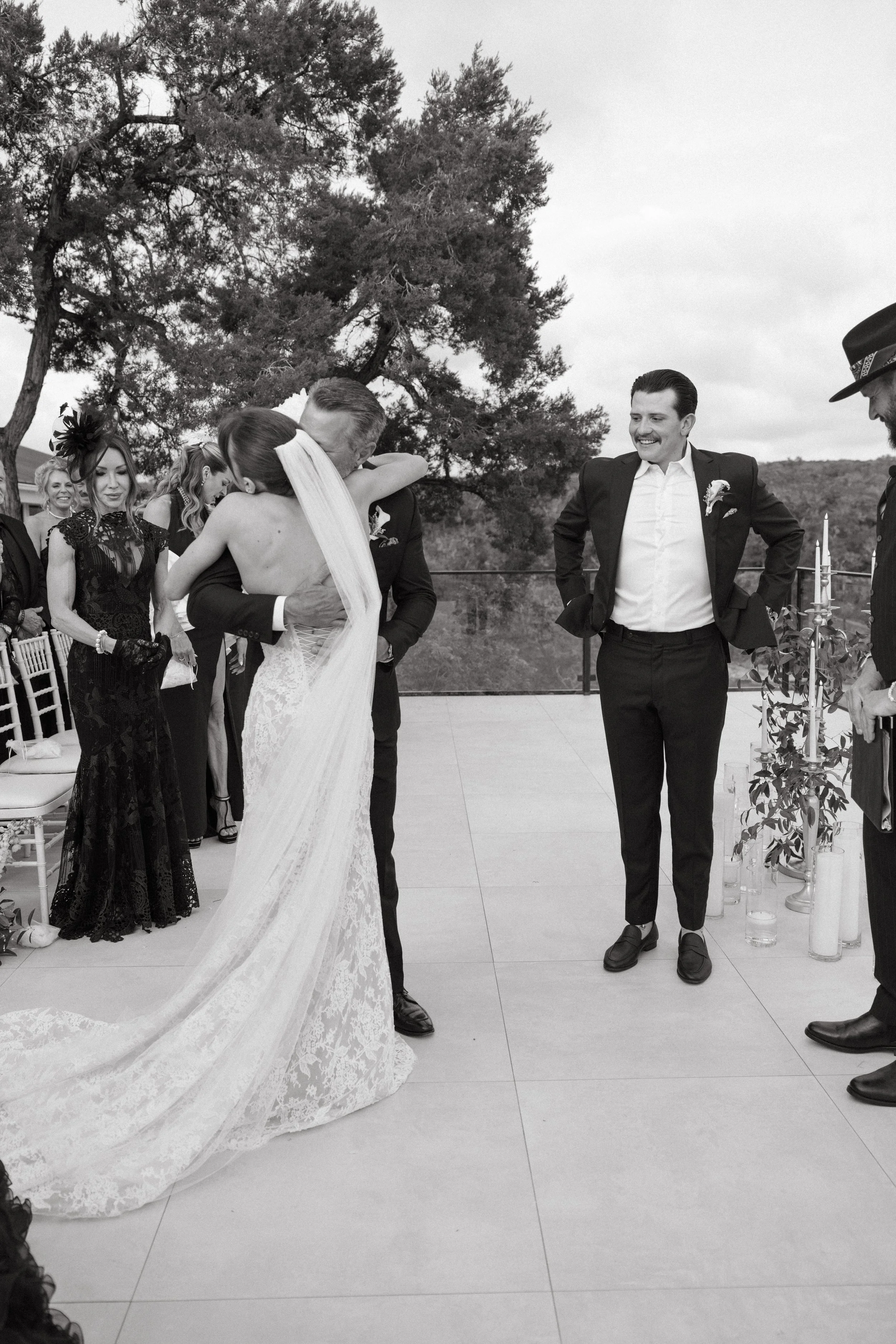 Wedding ceremony at The Videre Estate Wimberley Texas — Kentucky Derby aesthetic, black and white attire, film photography by Lauren Nicole Photo