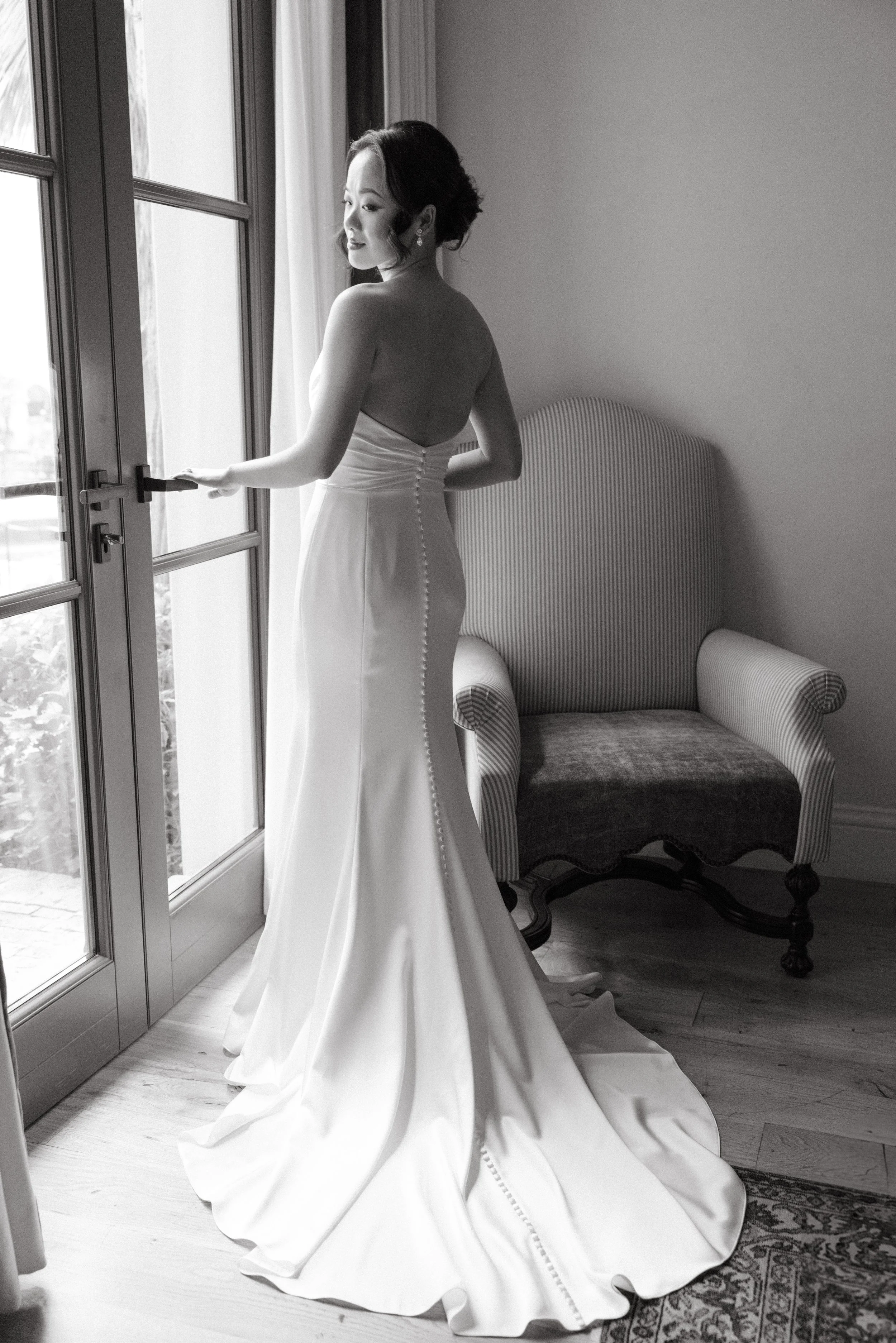 Bride getting ready at Commodore Perry Estate Austin Texas — Jimmy Choo shoes, luxury editorial elopement photography by Lauren Nicole Photo