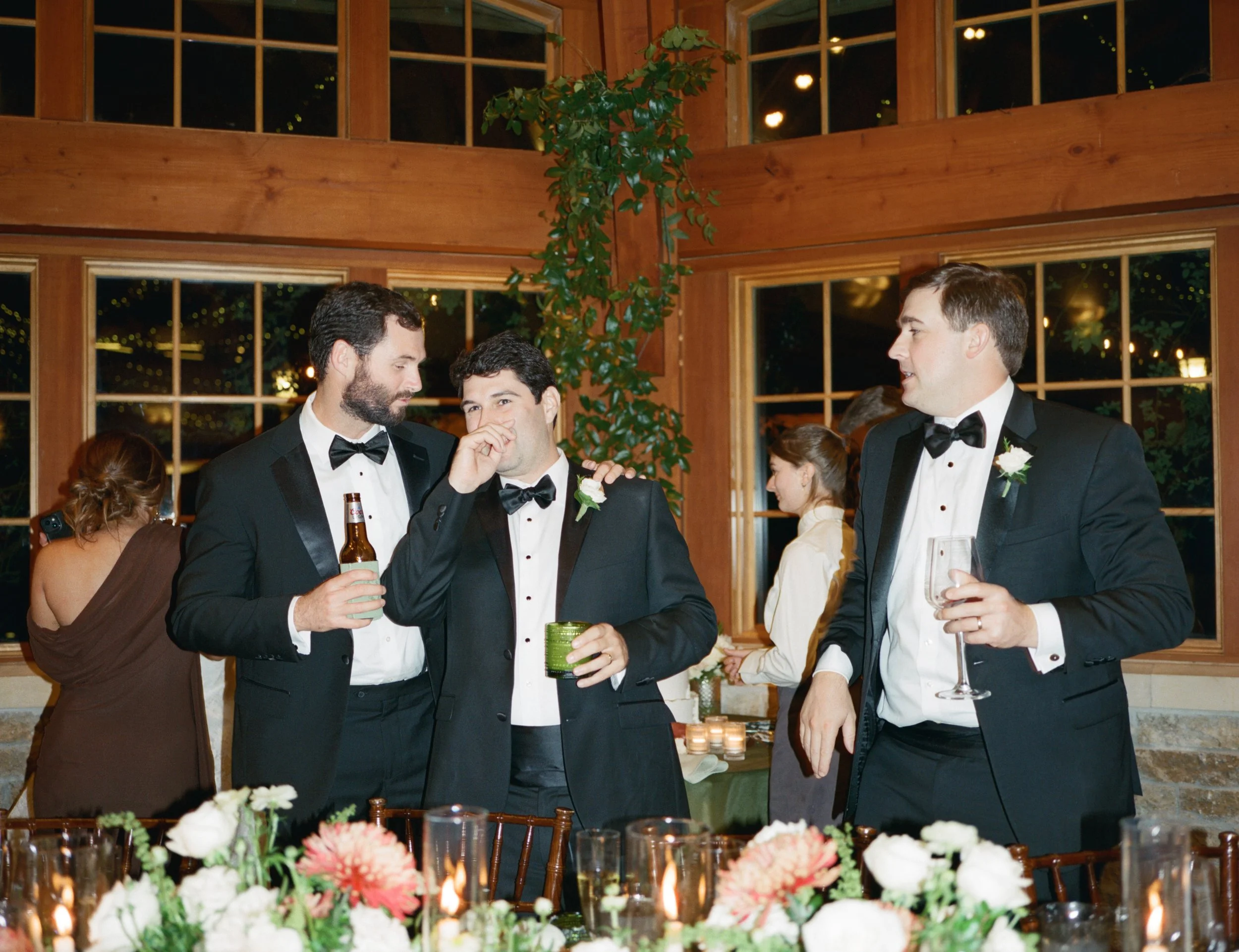 Old money floral wedding reception at Camp Lucy Sacred Oaks — candid documentary dance floor photography by Lauren Nicole Photo