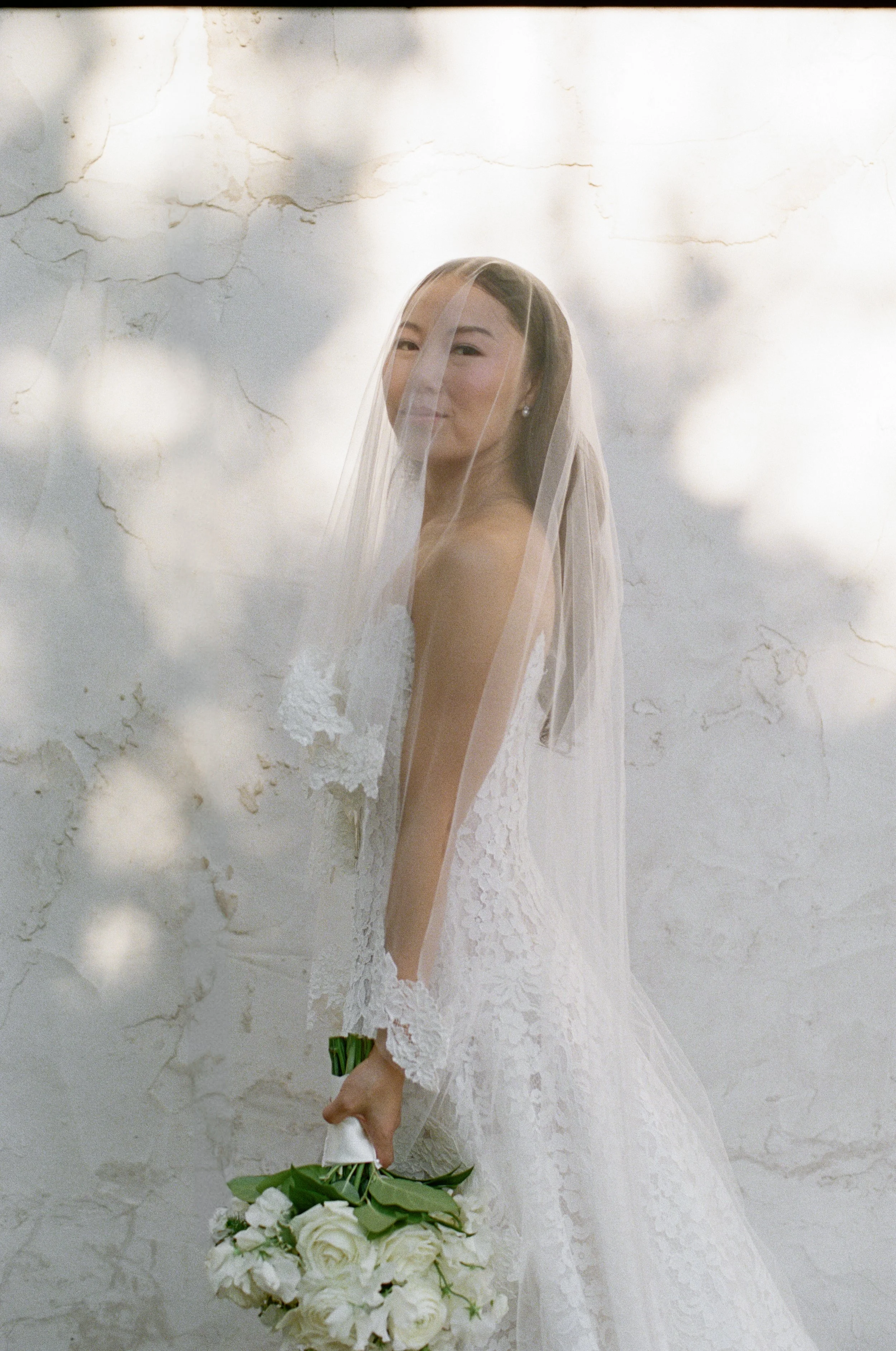 Bride in Lee Petra Grebenau gown at Villa Antonia Austin — editorial documentary wedding photography by Lauren Nicole