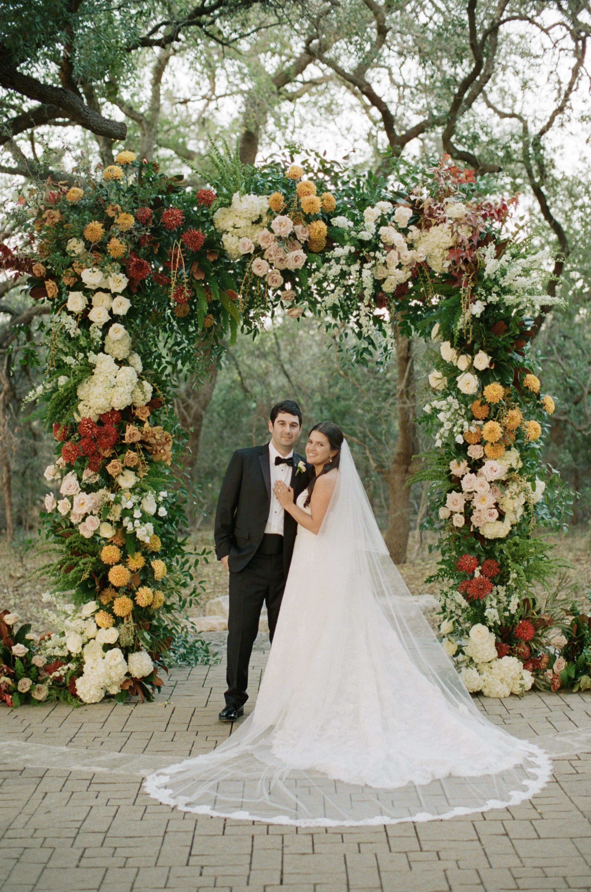 Wedding ceremony under oaks at Camp Lucy Sacred Oaks, Dripping Springs TX — Kristin Cattered Events, film photography by Lauren Nicole