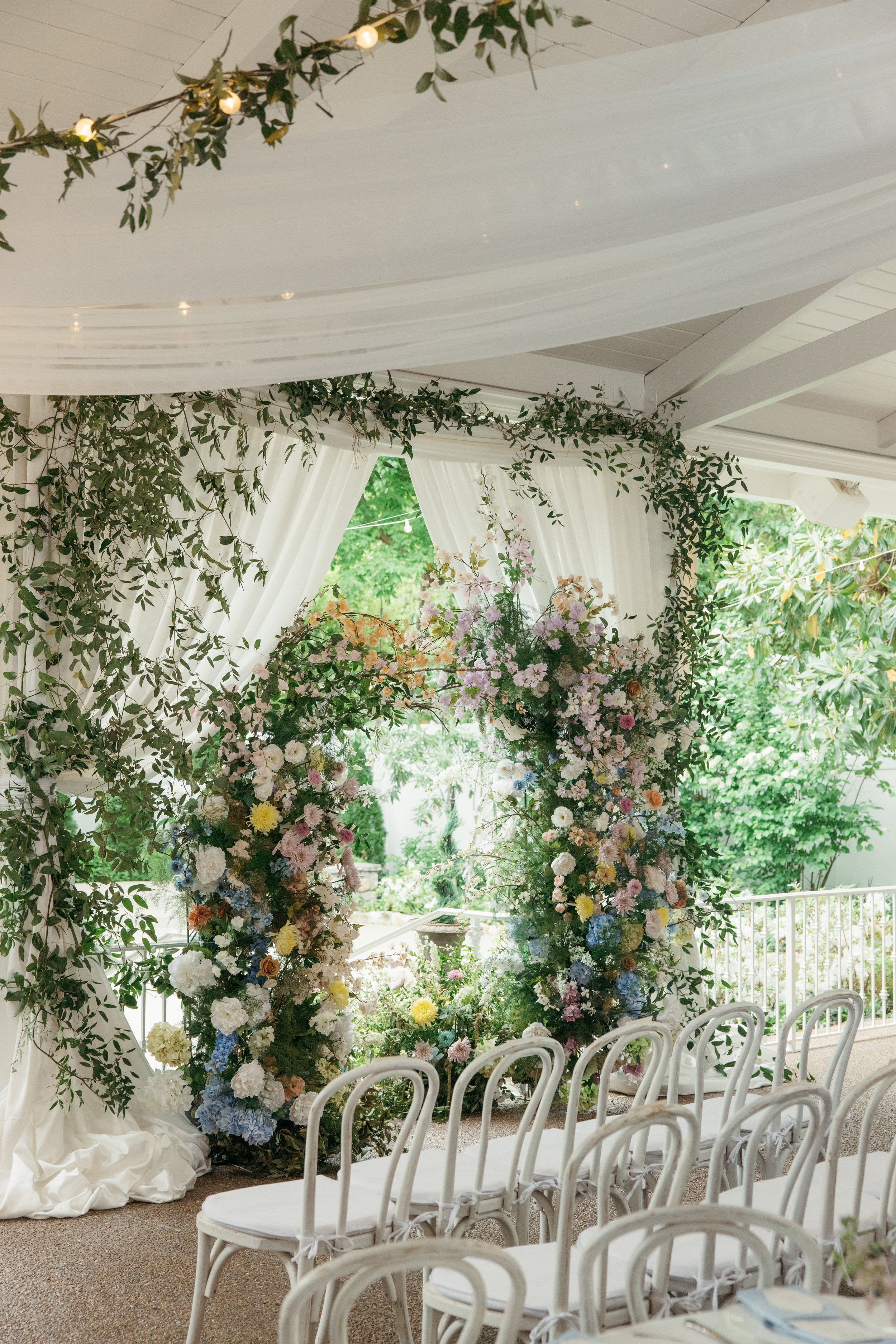 Whimsical garden party wedding at CJ's Off The Square, Franklin Tennessee — Cali Roots Designs, film photography by Lauren Nicole Photo