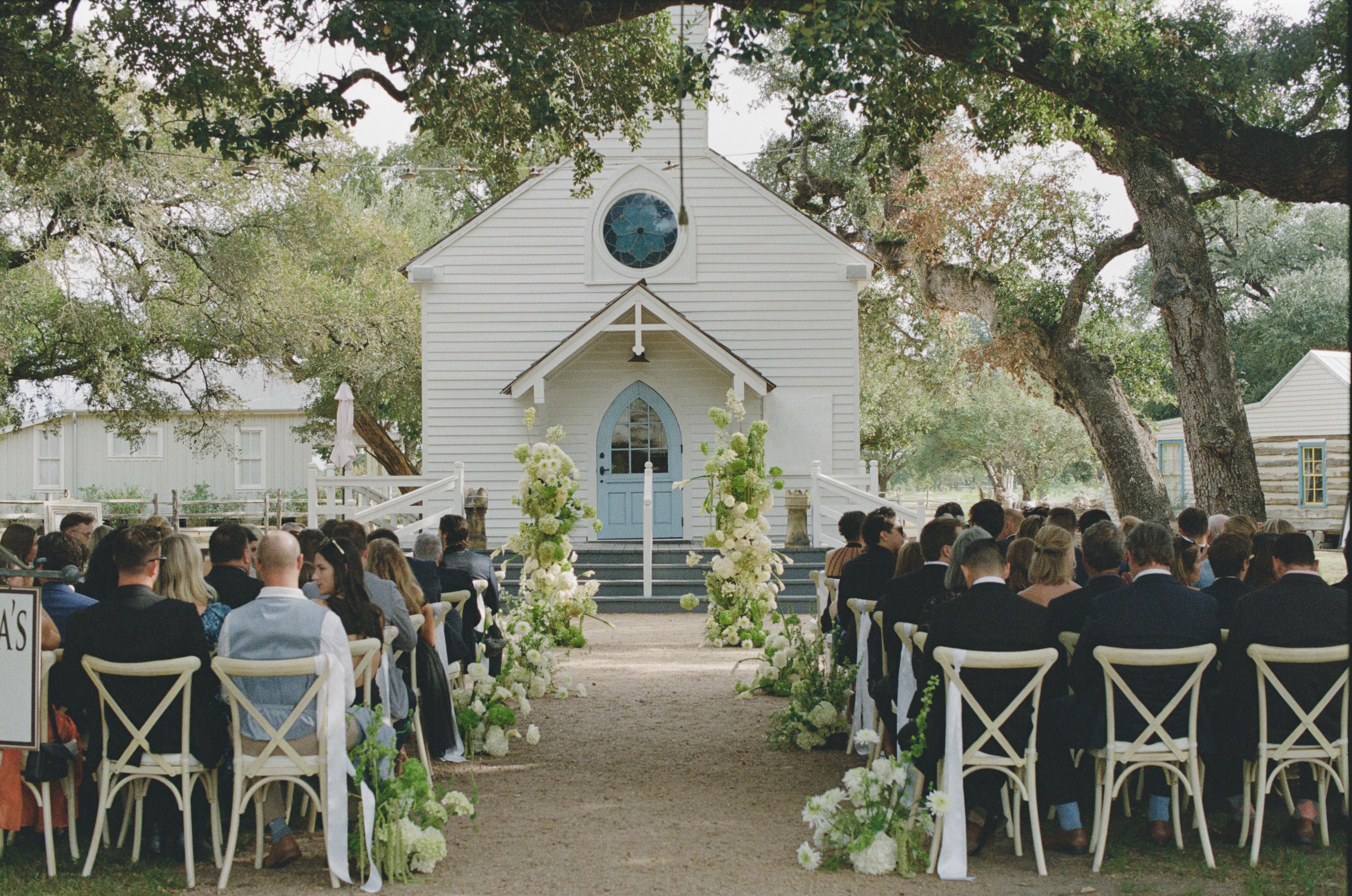 Wedding ceremony at Hotel Lulu Round Top Texas — southern chic western glam, candid film photography by Lauren Nicole Photo
